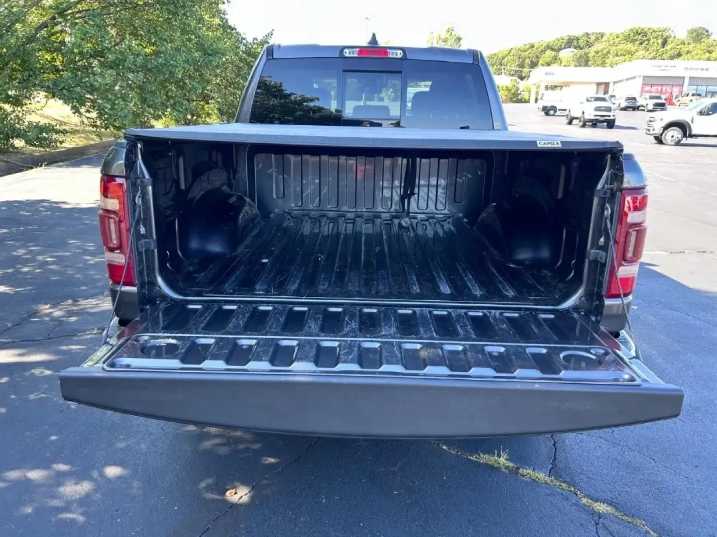 2022 /Black Leather Ram 1500 Laramie (1C6SRFJT9NN) with an 5.7L engine, located at 970 Woodlawn Dr., Farmington, MO, 63640, (573) 431-7800, 37.825642, -90.468674 - **Unleash Adventure with the 2022 Ram 1500 Perfect for Your Next Journey!**<br /> <br /> Are you ready to elevate your lifestyle with a versatile truck that can handle both daily commutes and weekend adventures? Look no further than this stunning 2022 Ram 1500, available now at Pettus CDJR Farmingt - Photo#4
