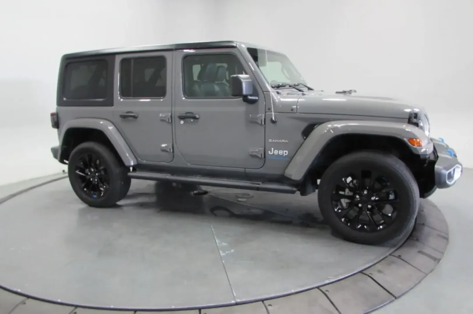2023 /Black Jeep Wrangler Sahara 4xe (1C4JJXP61PW) with an Other engine, Automatic transmission, located at 12830 Highway 21, De Soto, MO, 63020, (636) 337-7777, 38.153099, -90.573624 - **Unleash Your Adventurous Spirit with the 2023 Jeep Wrangler from Pettus CDJR DeSoto!**<br /> <br /> Are you ready to take on the open road and explore the great outdoors? The 2023 Jeep Wrangler, available at Pettus CDJR DeSoto, is your ticket to adventure, making it the perfect vehicle for weekend - Photo#3
