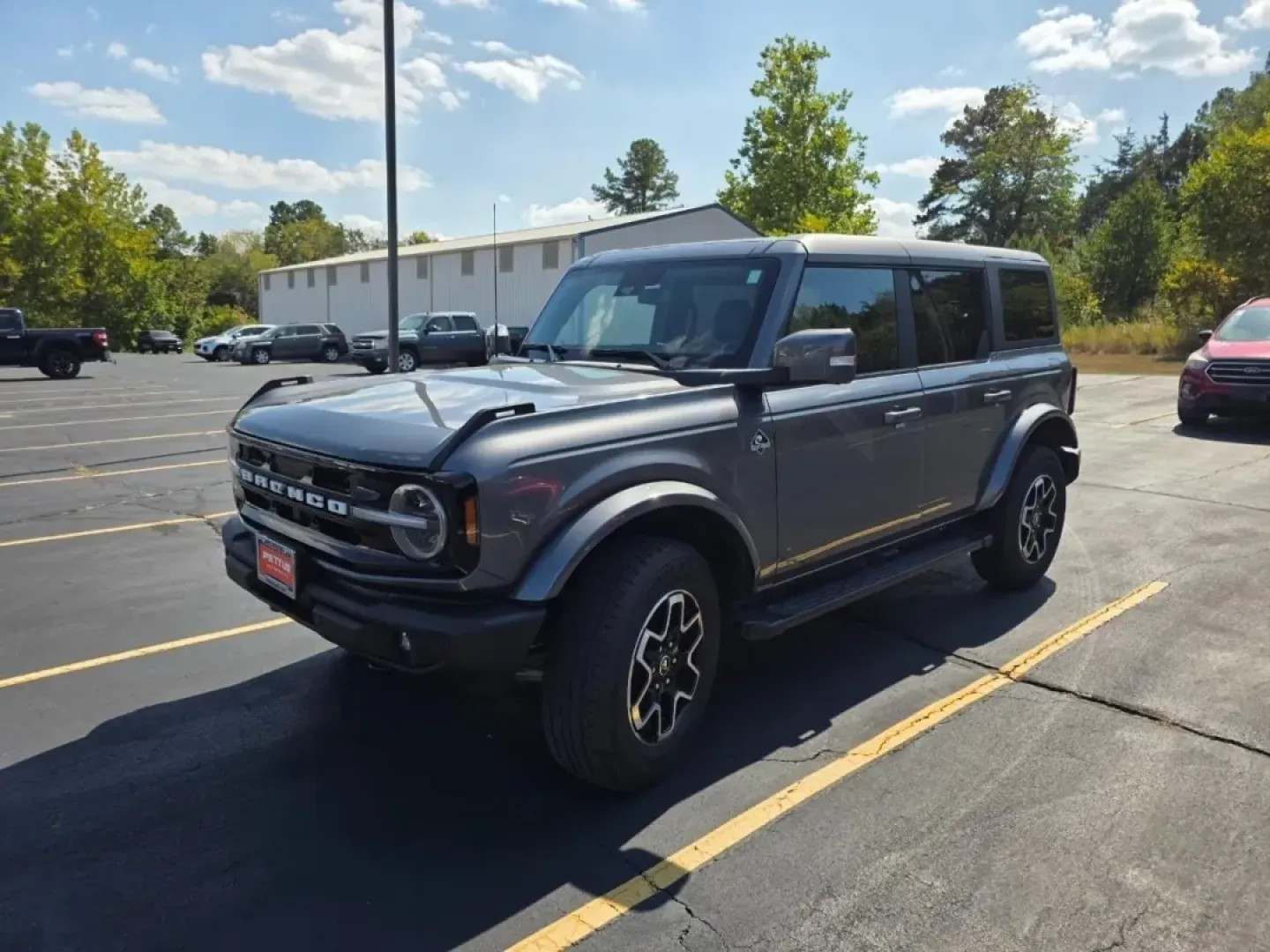 2023 /Dark Gray w/Navy Pier Leather Ford Bronco Outer Banks (1FMEE5BP4PL) with an 2.7L V6 engine, Automatic transmission, located at 970 Woodlawn Dr., Farmington, MO, 63640, (573) 431-7800, 37.825642, -90.468674 - **Adventure Awaits: Explore the 2023 Ford Bronco at Pettus CDJR Farmington!**<br /> <br /> Are you ready to take your outdoor adventures to the next level? The 2023 Ford Bronco is the quintessential SUV that combines rugged capability with modern comfort, making it the perfect companion for weekend - Photo#0