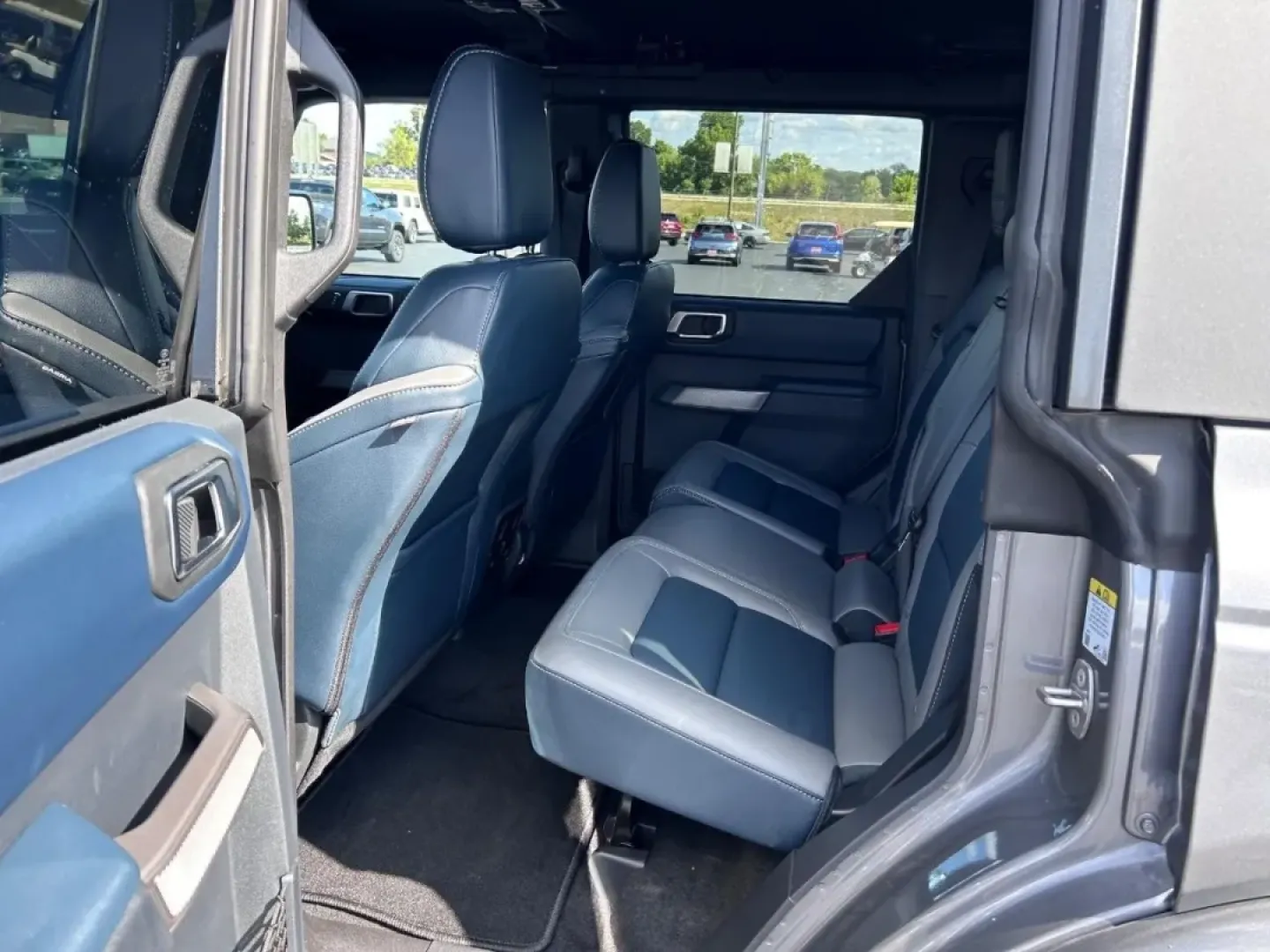 2023 /Dark Gray w/Navy Pier Leather Ford Bronco Outer Banks (1FMEE5BP4PL) with an 2.7L V6 engine, Automatic transmission, located at 970 Woodlawn Dr., Farmington, MO, 63640, (573) 431-7800, 37.825642, -90.468674 - **Adventure Awaits: Explore the 2023 Ford Bronco at Pettus CDJR Farmington!**<br /> <br /> Are you ready to take your outdoor adventures to the next level? The 2023 Ford Bronco is the quintessential SUV that combines rugged capability with modern comfort, making it the perfect companion for weekend - Photo#8