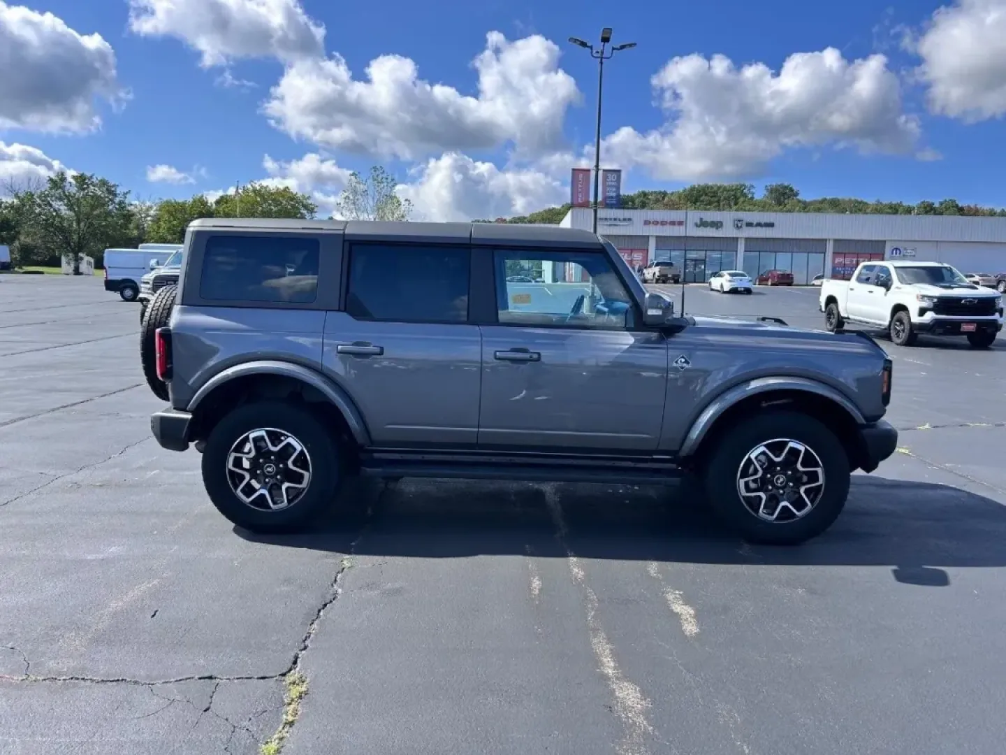 2023 /Dark Gray w/Navy Pier Leather Ford Bronco Outer Banks (1FMEE5BP4PL) with an 2.7L V6 engine, Automatic transmission, located at 970 Woodlawn Dr., Farmington, MO, 63640, (573) 431-7800, 37.825642, -90.468674 - **Adventure Awaits: Explore the 2023 Ford Bronco at Pettus CDJR Farmington!**<br /> <br /> Are you ready to take your outdoor adventures to the next level? The 2023 Ford Bronco is the quintessential SUV that combines rugged capability with modern comfort, making it the perfect companion for weekend - Photo#1