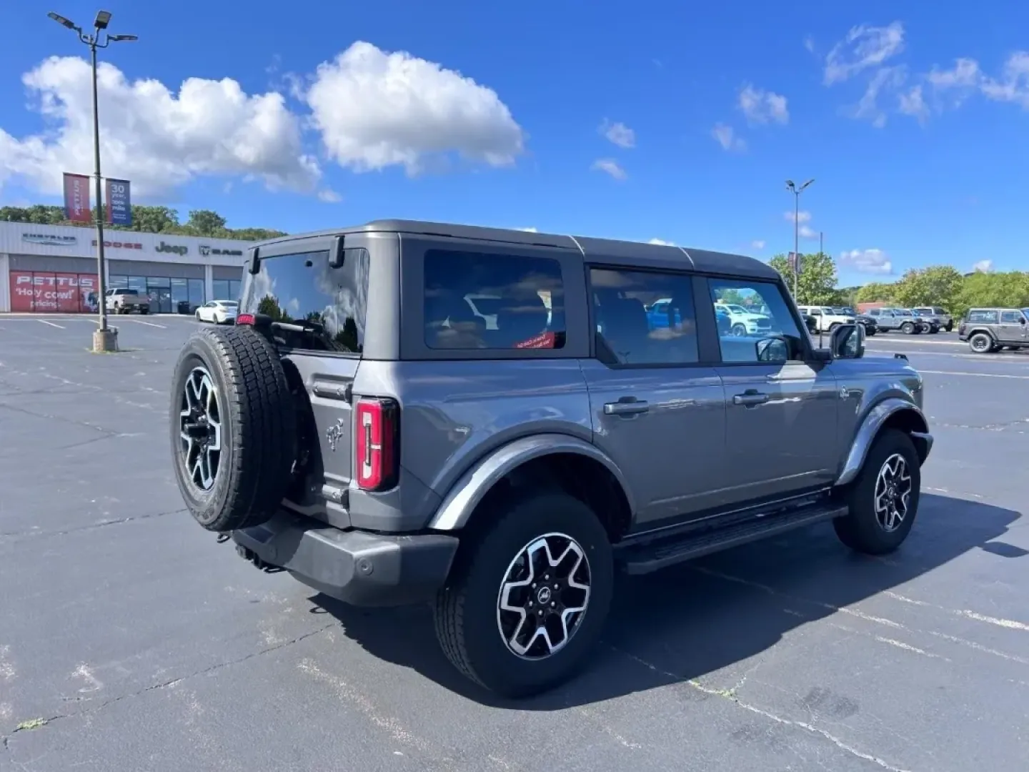 2023 /Dark Gray w/Navy Pier Leather Ford Bronco Outer Banks (1FMEE5BP4PL) with an 2.7L V6 engine, Automatic transmission, located at 970 Woodlawn Dr., Farmington, MO, 63640, (573) 431-7800, 37.825642, -90.468674 - **Adventure Awaits: Explore the 2023 Ford Bronco at Pettus CDJR Farmington!**<br /> <br /> Are you ready to take your outdoor adventures to the next level? The 2023 Ford Bronco is the quintessential SUV that combines rugged capability with modern comfort, making it the perfect companion for weekend - Photo#2