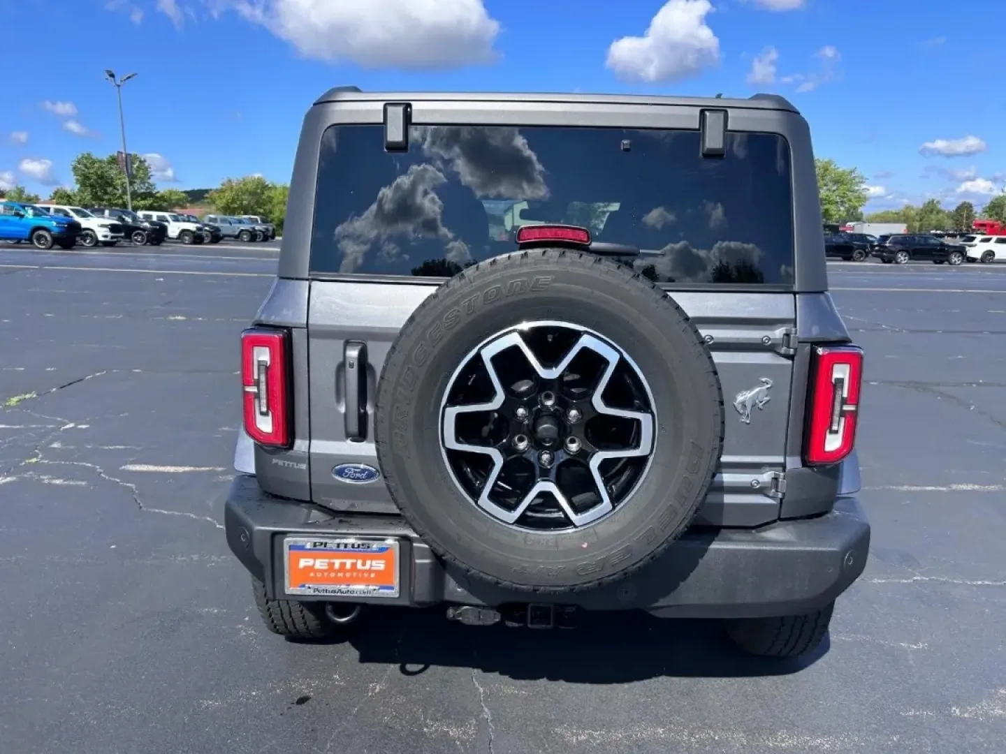 2023 /Dark Gray w/Navy Pier Leather Ford Bronco Outer Banks (1FMEE5BP4PL) with an 2.7L V6 engine, Automatic transmission, located at 970 Woodlawn Dr., Farmington, MO, 63640, (573) 431-7800, 37.825642, -90.468674 - **Adventure Awaits: Explore the 2023 Ford Bronco at Pettus CDJR Farmington!**<br /> <br /> Are you ready to take your outdoor adventures to the next level? The 2023 Ford Bronco is the quintessential SUV that combines rugged capability with modern comfort, making it the perfect companion for weekend - Photo#3