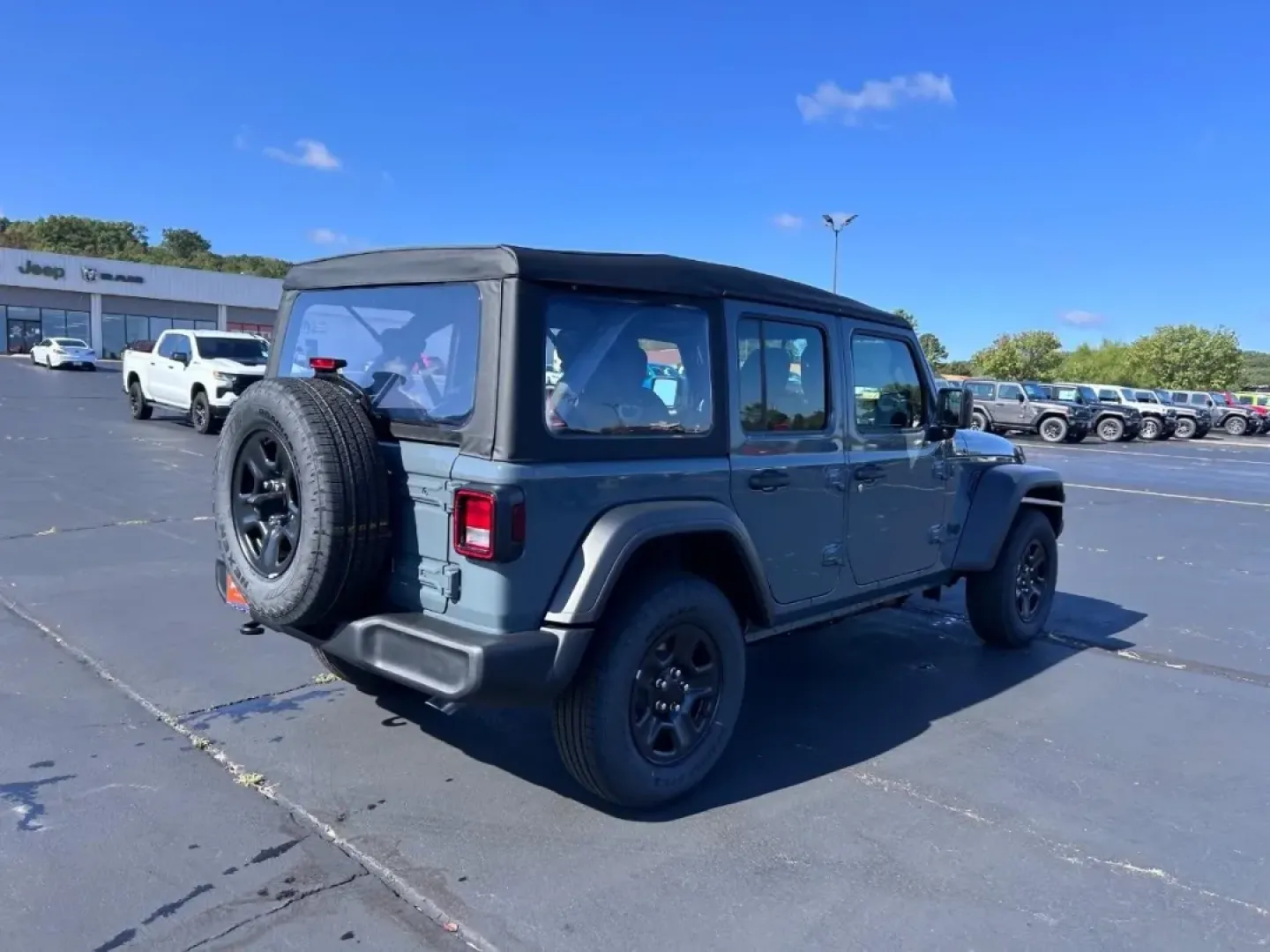 2025 /Black Cloth Jeep Wrangler Sport (1C4PJXDN2SW) with an 2.0L engine, located at 970 Woodlawn Dr., Farmington, MO, 63640, (573) 431-7800, 37.825642, -90.468674 - **Unleash Your Weekend Warrior: 2025 Jeep Wrangler at Pettus CDJR Farmington**<br /> <br /> Are you ready to take your weekend adventures to the next level? The 2025 Jeep Wrangler at Pettus CDJR Farmington is the perfect companion for those who crave the thrill of off-road escapades and the comfort - Photo#2