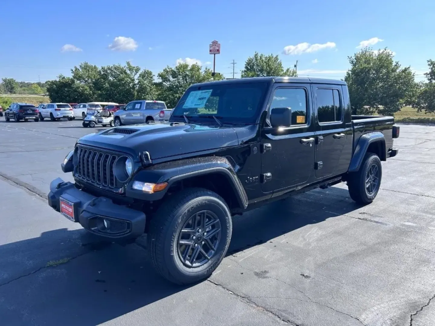 2025 /Black Cloth Jeep Gladiator Sport (1C6PJTAG5SL) with an 3.6L V6 24V VVT UPG I engine, Automatic transmission, located at 970 Woodlawn Dr., Farmington, MO, 63640, (573) 431-7800, 37.825642, -90.468674 - Are you ready for your next adventure? If you're seeking a vehicle that combines rugged capability with everyday practicality, look no further than the 2025 Jeep Gladiator available at Pettus CDJR Farmington. This exceptional truck is engineered to provide the ultimate driving experience, whether yo - Photo#6
