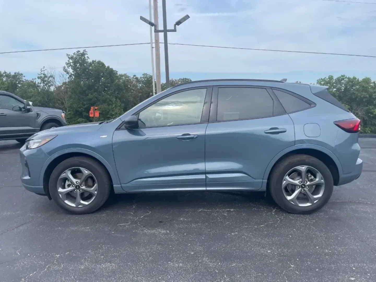 2023 /Ebony With Red Stitching Ford Escape ST-Line (1FMCU9MN6PU) with an Other engine, Automatic transmission, located at 12836 Highway 21, De Soto, MO, 63020, (636) 337-7777, 38.151867, -90.575615 - Discover the perfect blend of style, comfort, and versatility with this stunning 2023 Ford Escape ST-Line, available now at Pettus Ford De Soto in De Soto, MO. Whether you're a growing family in need of a reliable family vehicle, an urban commuter looking for efficiency, or an adventure seeker ready - Photo#1