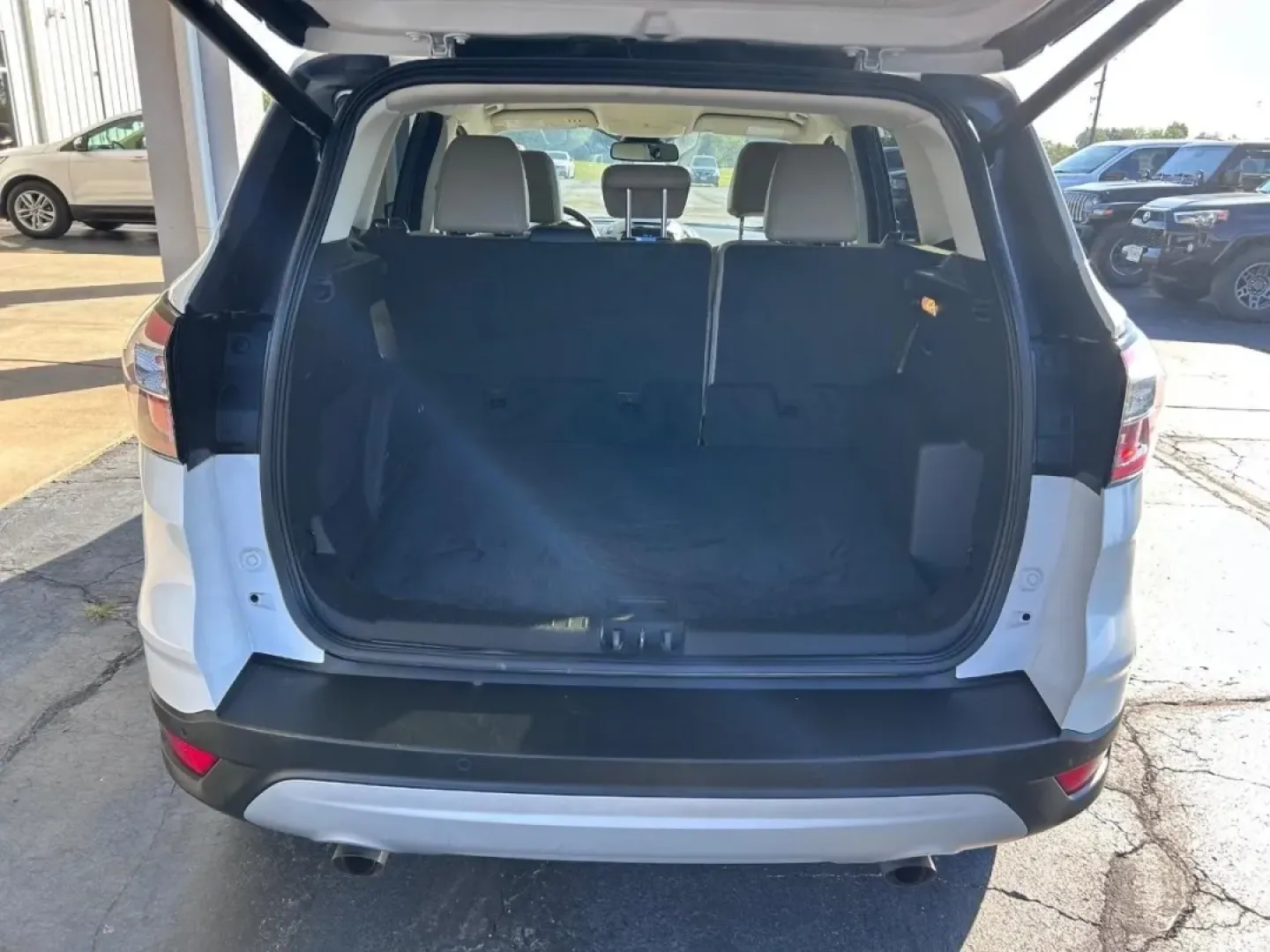 2017 /Medium Light Stone Leather Ford Escape Titanium (1FMCU0J91HU) with an 2.0L engine, Automatic transmission, located at 141 Commercial Dr, Fredericktown, MO, 63645, (573) 783-6432, 37.570087, -90.320648 - Are you looking for a versatile SUV that can handle everything from daily commutes to weekend adventures? Look no further than this stunning 2017 Ford Escape Titanium, available now at Pettus Ford Fredericktown! With its spacious interior and innovative features, this pre-owned SUV is the perfect ch - Photo#4