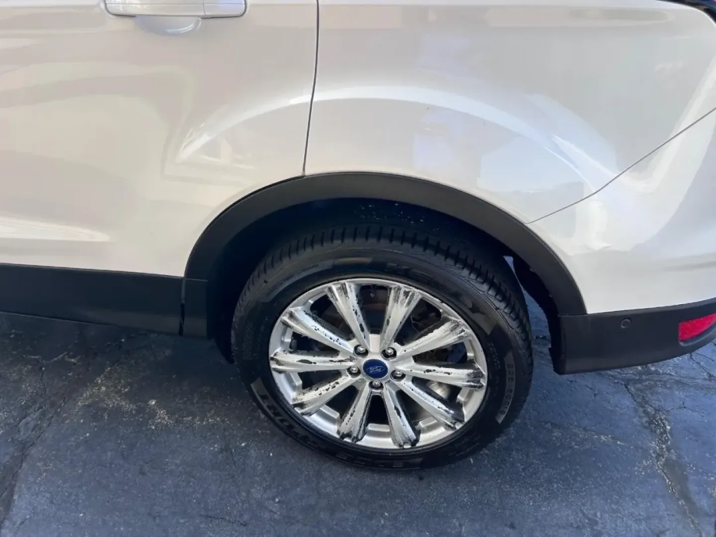 2017 /Medium Light Stone Leather Ford Escape Titanium (1FMCU0J91HU) with an 2.0L engine, Automatic transmission, located at 141 Commercial Dr, Fredericktown, MO, 63645, (573) 783-6432, 37.570087, -90.320648 - Are you looking for a versatile SUV that can handle everything from daily commutes to weekend adventures? Look no further than this stunning 2017 Ford Escape Titanium, available now at Pettus Ford Fredericktown! With its spacious interior and innovative features, this pre-owned SUV is the perfect ch - Photo#6