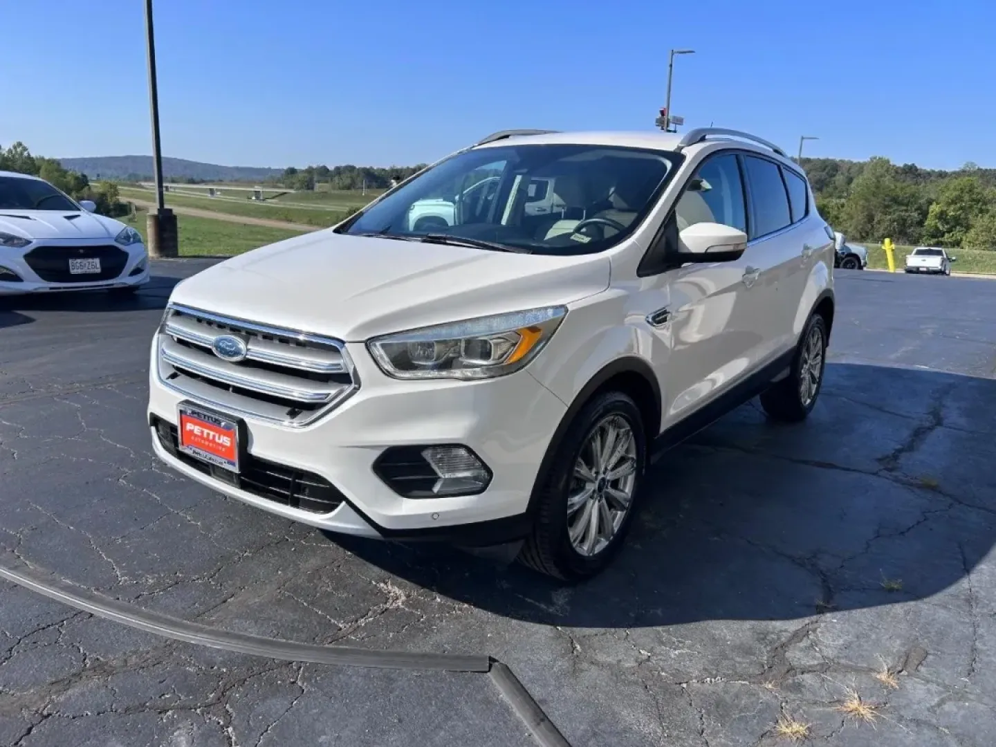 2017 /Medium Light Stone Leather Ford Escape Titanium (1FMCU0J91HU) with an 2.0L engine, Automatic transmission, located at 141 Commercial Dr, Fredericktown, MO, 63645, (573) 783-6432, 37.570087, -90.320648 - Are you looking for a versatile SUV that can handle everything from daily commutes to weekend adventures? Look no further than this stunning 2017 Ford Escape Titanium, available now at Pettus Ford Fredericktown! With its spacious interior and innovative features, this pre-owned SUV is the perfect ch - Photo#7