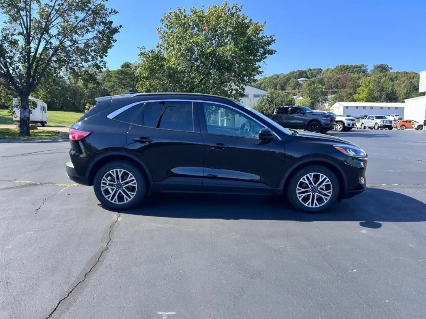 2021 /Ebony Leather Ford Escape SEL (1FMCU0CZ2MU) with an 2.5L iVCT Atkinson Cycle I-4 Hybrid engine, Automatic transmission, located at 970 Woodlawn Dr., Farmington, MO, 63640, (573) 431-7800, 37.825642, -90.468674 - **Discover Your Next Adventure with the 2021 Ford Escape SEL at Pettus CDJR Farmington!**<br /> <br /> Are you ready to elevate your driving experience? Whether you're navigating the hustle and bustle of daily commutes, planning weekend getaways, or carting the family around town, the 2021 Ford Esca - Photo#1