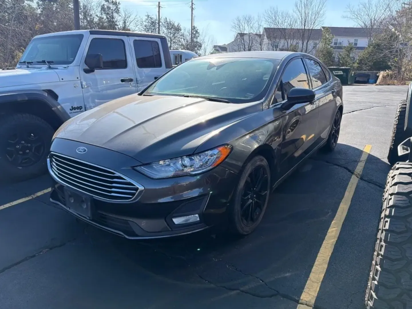 2020 /Ebony Cloth Ford Fusion SE (3FA6P0HDXLR) with an 1.5L EcoBoost engine, Automatic transmission, located at 970 Woodlawn Dr., Farmington, MO, 63640, (573) 431-7800, 37.825642, -90.468674 - **Drive in Style with the 2020 Ford Fusion SE Your Perfect Commuter Companion!**<br /> <br /> Are you searching for a reliable and stylish vehicle that effortlessly meets the demands of everyday life? Look no further than the 2020 Ford Fusion SE, available now at Pettus CDJR Farmington. This four-d - Photo#0
