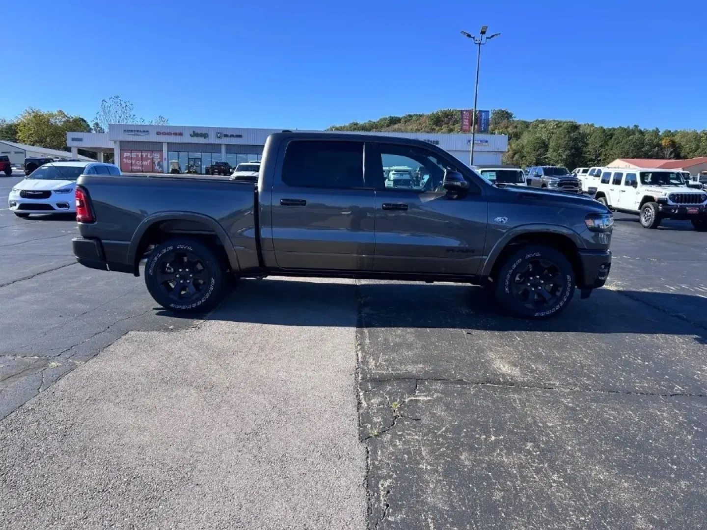 2026 /Black Cloth Ram 1500 Big Horn/Lone Star (1C6SRFFT7TN) with an 5.7L engine, located at 970 Woodlawn Dr., Farmington, MO, 63640, (573) 431-7800, 37.825642, -90.468674 - **Unleash Your Adventures with the 2026 Ram 1500 Big Horn at Pettus CDJR Farmington!**<br /> <br /> Are you in the market for a vehicle that combines rugged capability with modern comfort? Look no further than the stunning 2026 Ram 1500 Big Horn available now at Pettus CDJR Farmington. Whether you'r - Photo#1