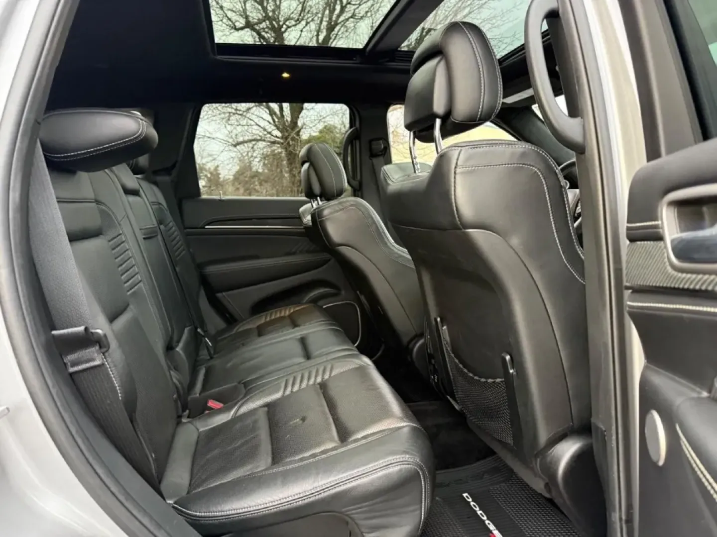 2017 /Black/Black Leather Jeep Grand Cherokee SRT (1C4RJFDJ4HC) with an 6.4L SRT HEMI V8 engine, Automatic transmission, located at 970 Woodlawn Dr., Farmington, MO, 63640, (573) 431-7800, 37.825642, -90.468674 - **Adventure Awaits with This 2017 Jeep Grand Cherokee 4WD SRT Your Ideal SUV for Life's Journeys!**<br /> <br /> Are you ready to elevate your everyday adventures? If you're seeking a powerful, reliable SUV that can handle both the daily commute and off-road excursions, look no further than this ** - Photo#9