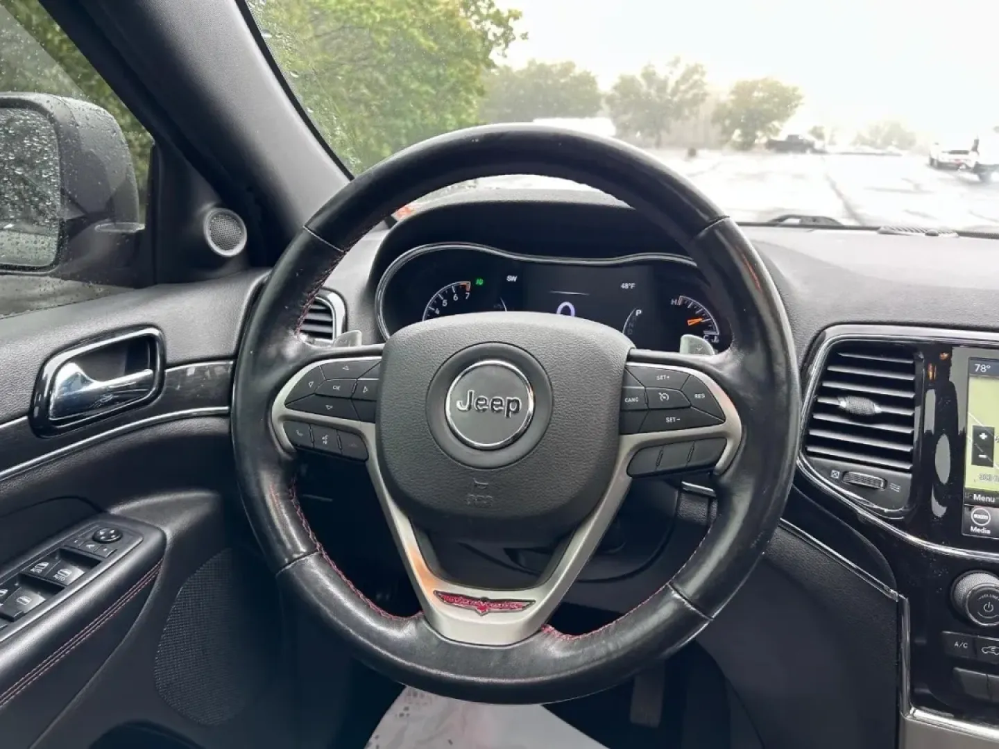 2021 /Ruby Red/Black Suede Jeep Grand Cherokee Trailhawk (1C4RJFLG6MC) with an 3.6L V6 24V VVT UPG I engine, located at 970 Woodlawn Dr., Farmington, MO, 63640, (573) 431-7800, 37.825642, -90.468674 - **Experience the Thrill of Adventure with the 2021 Jeep Grand Cherokee Trailhawk!**<br /> <br /> Are you ready to elevate your outdoor adventures and weekend getaways? Look no further than the **2021 Jeep Grand Cherokee Trailhawk**, a robust SUV that perfectly balances rugged capability with everyda - Photo#12