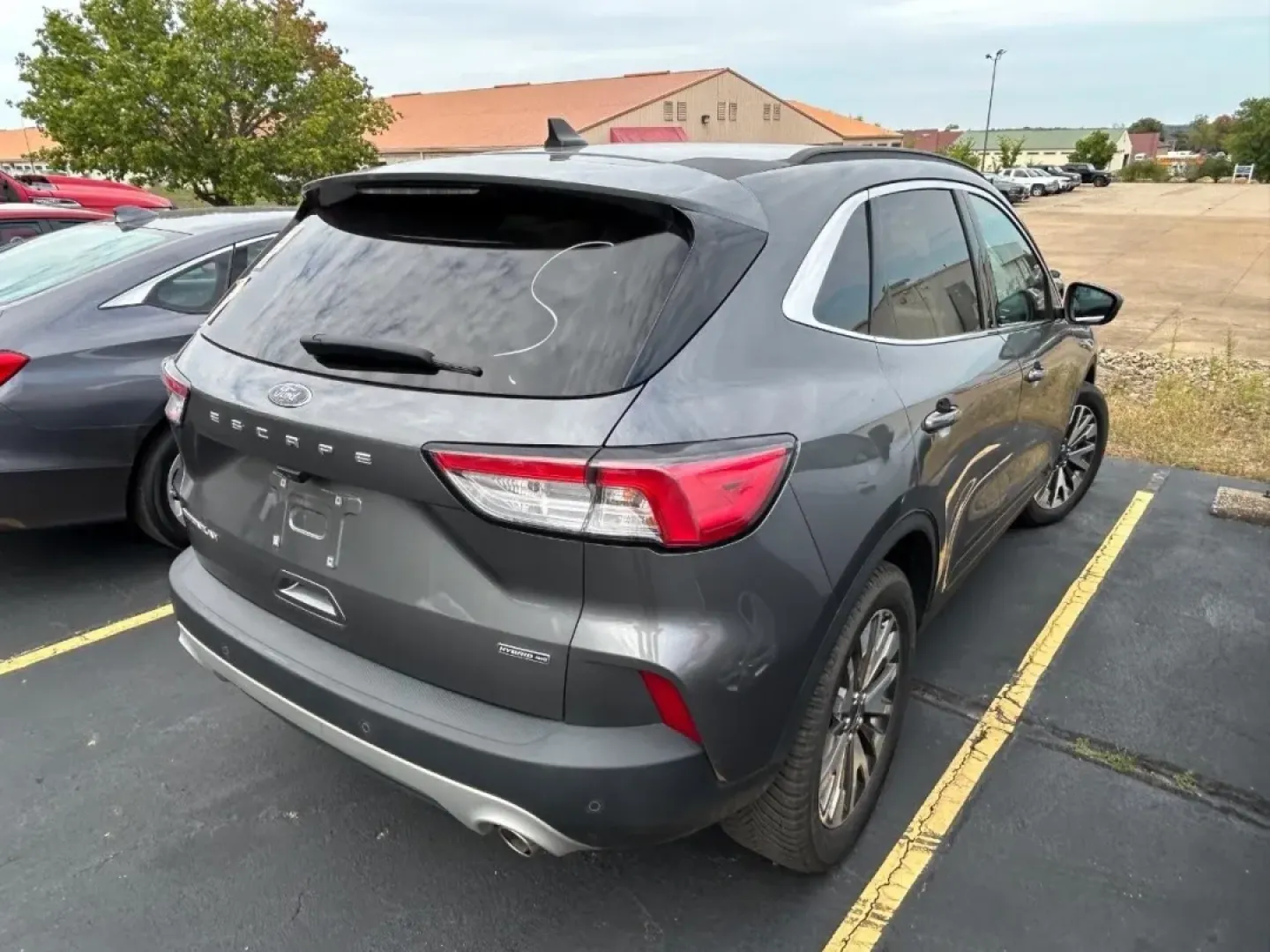 2022 /Sandstone Leather Ford Escape Titanium (1FMCU9DZ1NU) with an 2.5L iVCT Atkinson Cycle I-4 Hybrid engine, Automatic transmission, located at 970 Woodlawn Dr., Farmington, MO, 63640, (573) 431-7800, 37.825642, -90.468674 - ### Discover Adventure with the 2022 Ford Escape Titanium Hybrid at Pettus CDJR Farmington!<br /> <br /> Are you ready to elevate your driving experience? Imagine weekend road trips with family, scenic drives to nearby attractions, or even your daily commute transformed into a pleasure rather than a - Photo#5