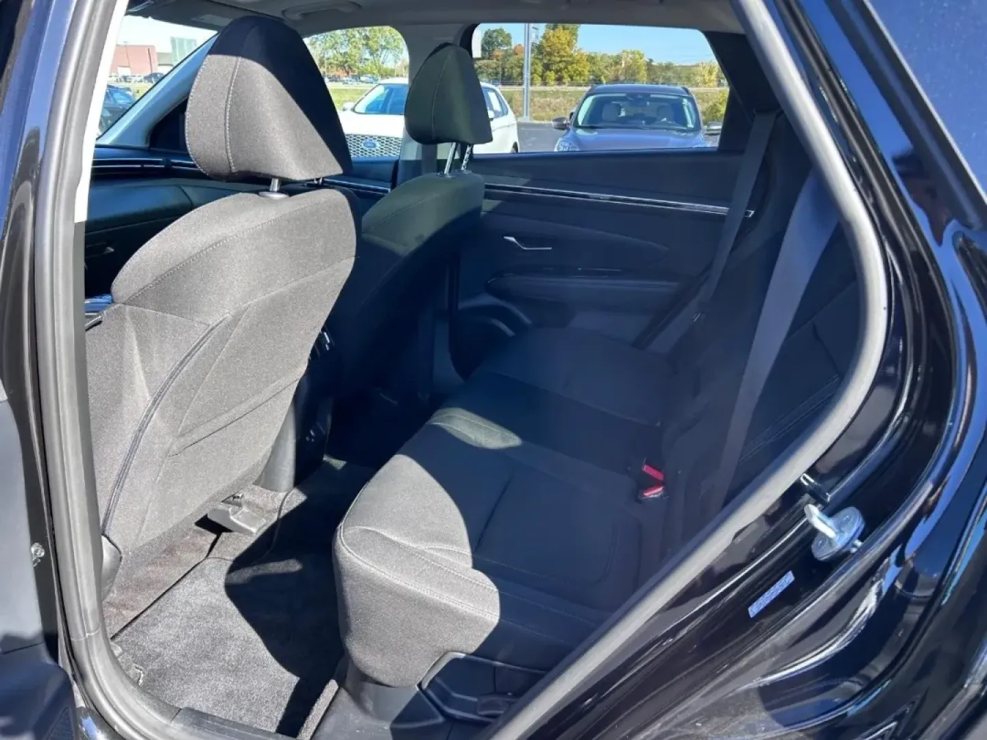 2022 /Black Cloth Hyundai Tucson SEL Convenience (KM8JFCA10NU) with an 1.6L Turbo GDI DOHC 16-Valve I4 CVVD engine, Automatic transmission, located at 970 Woodlawn Dr., Farmington, MO, 63640, (573) 431-7800, 37.825642, -90.468674 - Are you on the lookout for the perfect vehicle to elevate your family's adventures and everyday commutes? Look no further! At Pettus CDJR Farmington, we are excited to offer you an exceptional deal on a 2022 Hyundai Tucson SEL Convenience that effortlessly blends style, efficiency, and versatility. - Photo#9