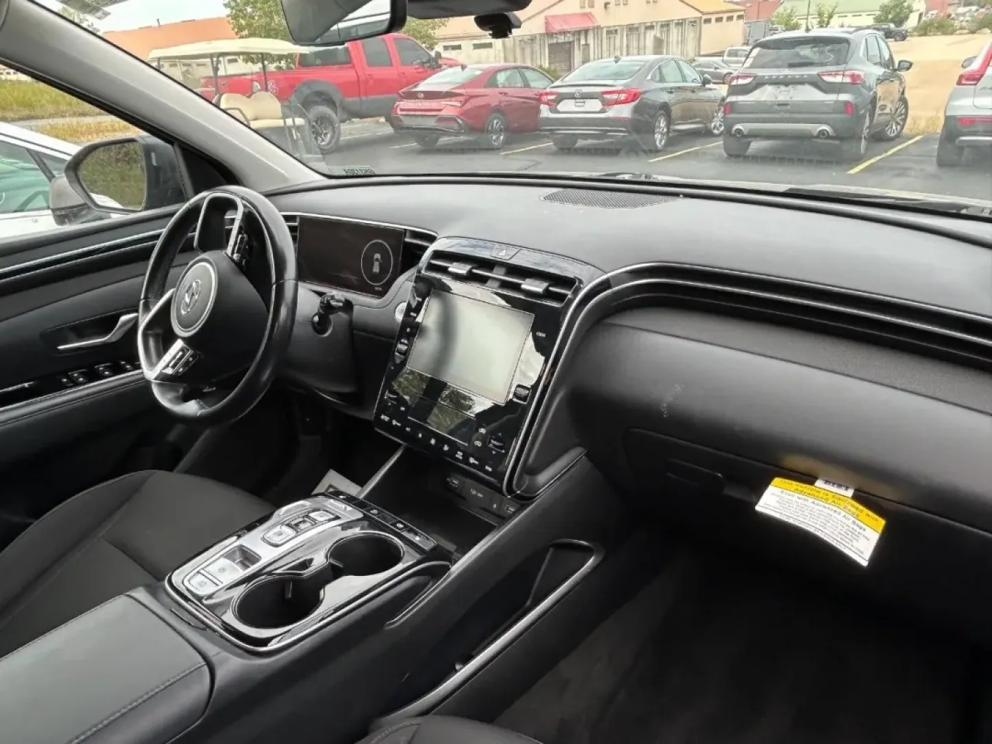 2022 /Black Cloth Hyundai Tucson SEL Convenience (KM8JFCA10NU) with an 1.6L Turbo GDI DOHC 16-Valve I4 CVVD engine, Automatic transmission, located at 970 Woodlawn Dr., Farmington, MO, 63640, (573) 431-7800, 37.825642, -90.468674 - Are you on the lookout for the perfect vehicle to elevate your family's adventures and everyday commutes? Look no further! At Pettus CDJR Farmington, we are excited to offer you an exceptional deal on a 2022 Hyundai Tucson SEL Convenience that effortlessly blends style, efficiency, and versatility. - Photo#6