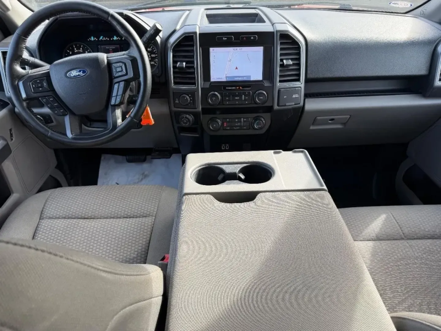 2019 /Dark Earth Gray Cloth Ford F-150 4WD SuperCrew Box (1FTEW1E55KK) with an 5.0L engine, located at 970 Woodlawn Dr., Farmington, MO, 63640, (573) 431-7800, 37.825642, -90.468674 - **Unleash Adventure with the 2019 Ford F-150 at Pettus CDJR Farmington!**<br /> <br /> Are you ready to tackle your next big adventure? Whether you're hauling gear for a weekend camping trip, navigating the daily grind, or transporting your family to the next soccer game, the 2019 Ford F-150 is your - Photo#10