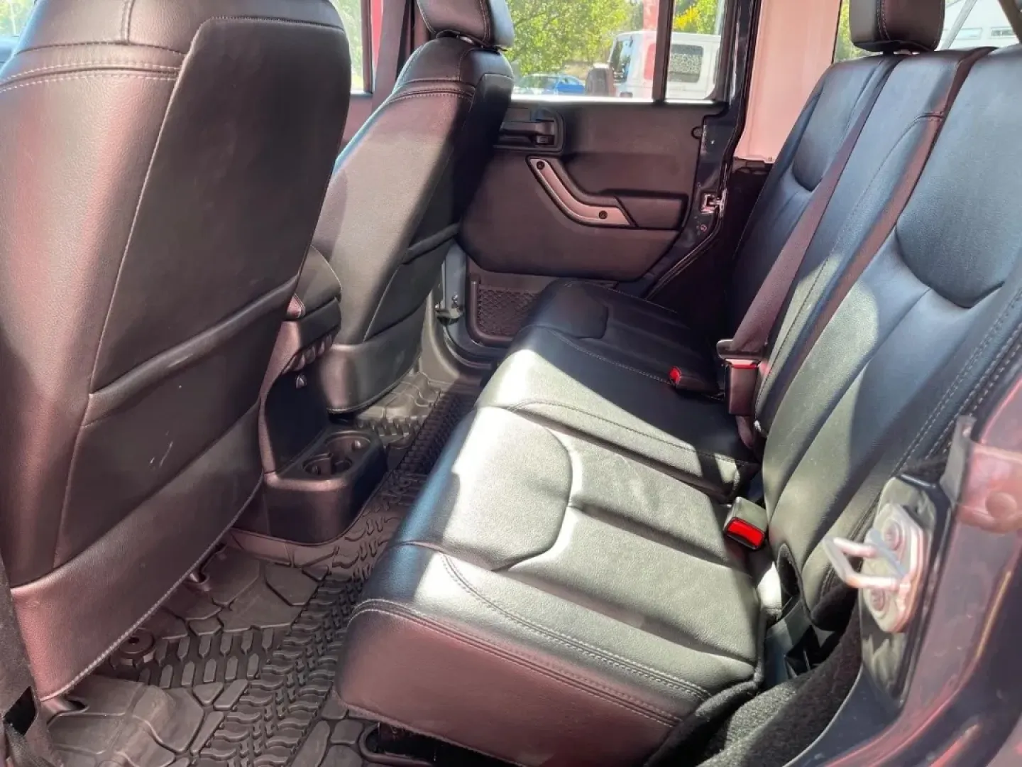 2018 /Black Leather Jeep Wrangler Unlimited Altitude (1C4BJWEG9JL) with an 3.6L V6 24V VVT engine, located at 970 Woodlawn Dr., Farmington, MO, 63640, (573) 431-7800, 37.825642, -90.468674 - Are you ready to embark on your next adventure? Whether you're navigating city streets or tackling rugged trails, the 2018 Jeep Wrangler is the ultimate companion for those who crave both excitement and reliability. At Pettus CDJR Farmington, we understand that your vehicle is more than just a means - Photo#9