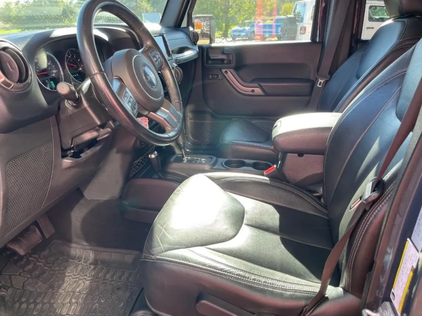 2018 /Black Leather Jeep Wrangler Unlimited Altitude (1C4BJWEG9JL) with an 3.6L V6 24V VVT engine, located at 970 Woodlawn Dr., Farmington, MO, 63640, (573) 431-7800, 37.825642, -90.468674 - Are you ready to embark on your next adventure? Whether you're navigating city streets or tackling rugged trails, the 2018 Jeep Wrangler is the ultimate companion for those who crave both excitement and reliability. At Pettus CDJR Farmington, we understand that your vehicle is more than just a means - Photo#7