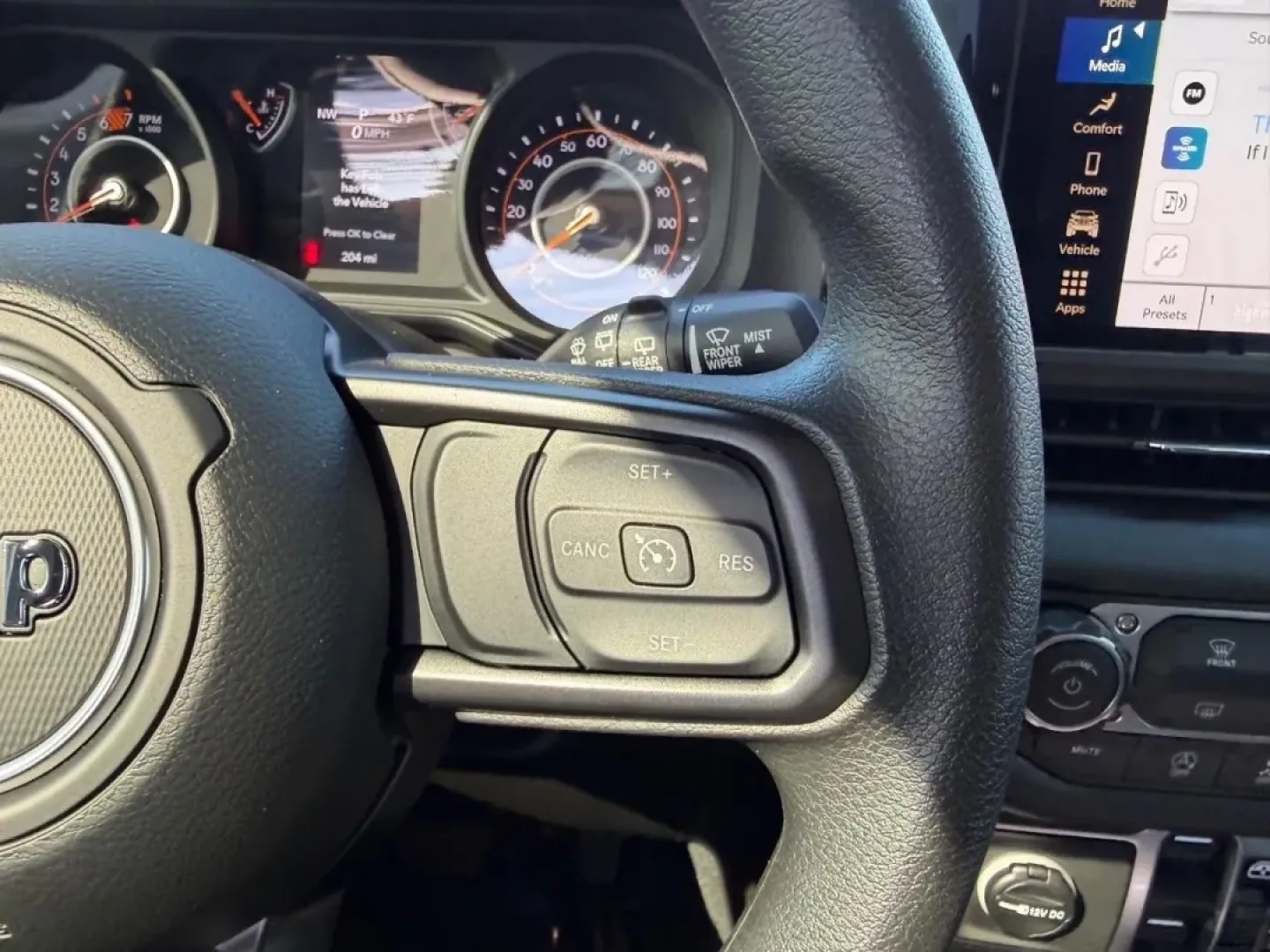 2026 /Black Cloth Jeep Wrangler Sport (1C4PJXDN9TW) with an 2.0L engine, 6M transmission, located at 970 Woodlawn Dr., Farmington, MO, 63640, (573) 431-7800, 37.825642, -90.468674 - **Adventure Awaits: Discover the 2026 Jeep Wrangler at Pettus CDJR DeSoto!**<br /> <br /> Are you ready to elevate your outdoor adventures and weekend getaways? The 2026 Jeep Wrangler is your ticket to exploration! This rugged SUV isn't just a vehicle; it's a lifestyle choice for those who crave fre - Photo#12