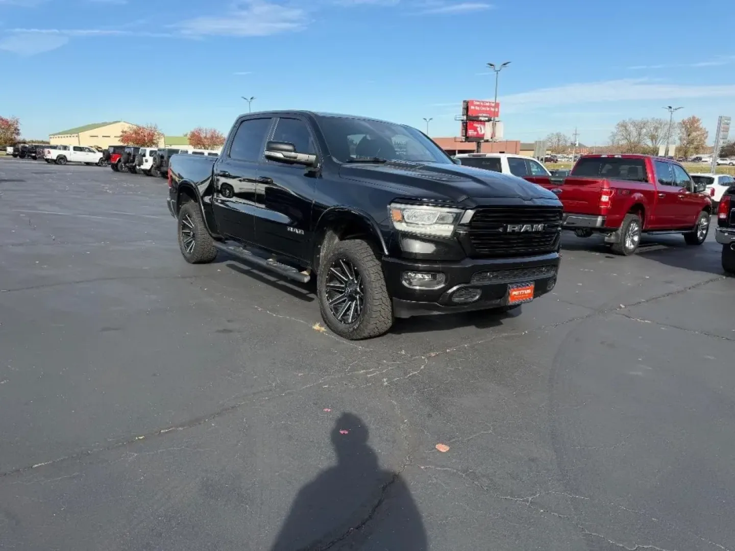 2021 /Black Leather Ram 1500 Laramie (1C6SRFJT5MN) with an 5.7L engine, located at 970 Woodlawn Dr., Farmington, MO, 63640, (573) 431-7800, 37.825642, -90.468674 - **Adventure Awaits with the 2021 Ram 1500 Your Perfect Truck for Any Journey!**<br /> <br /> Are you ready to elevate your driving experience? Whether you're hauling gear for a weekend getaway or navigating your daily commute, the 2021 Ram 1500 at Pettus CDJR Farmington is the ultimate companion fo - Photo#0