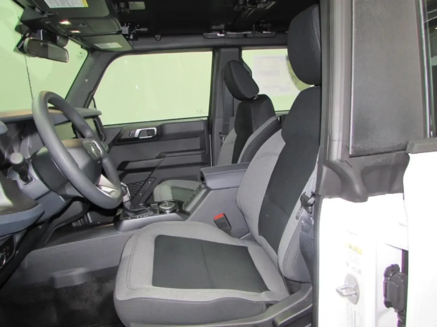 2025 /Dark Gray W/Black Onyx Ford Bronco Base (1FMDE6BH7SL) with an 2.3L EcoBoost I-4 engine, located at 12836 Highway 21, De Soto, MO, 63020, (636) 337-7777, 38.151867, -90.575615 - For adventurers and outdoor enthusiasts seeking their next thrill, the 2025 Ford Bronco is the ideal companion, ready to tackle rugged trails and urban jungles alike. With its robust 2.3L EcoBoost I-4 engine and four-wheel drive, this SUV is built for both weekend getaways and daily commutes. If you - Photo#8