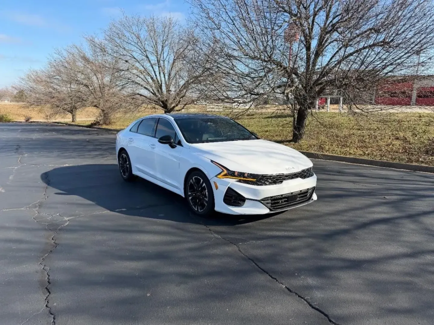 2022 /Black Leather Kia K5 GT-Line (5XXG64J20NG) with an 1.6L Turbo GDI DOHC I4 engine, Automatic transmission, located at 970 Woodlawn Dr., Farmington, MO, 63640, (573) 431-7800, 37.825642, -90.468674 - Discover the perfect blend of style, efficiency, and comfort with the 2022 Kia K5 GT-Line, an exceptional choice for those seeking a reliable yet luxurious ride. Whether you're commuting to work, taking the family on a weekend getaway, or simply running errands around Farmington, MO, this four-door - Photo#0