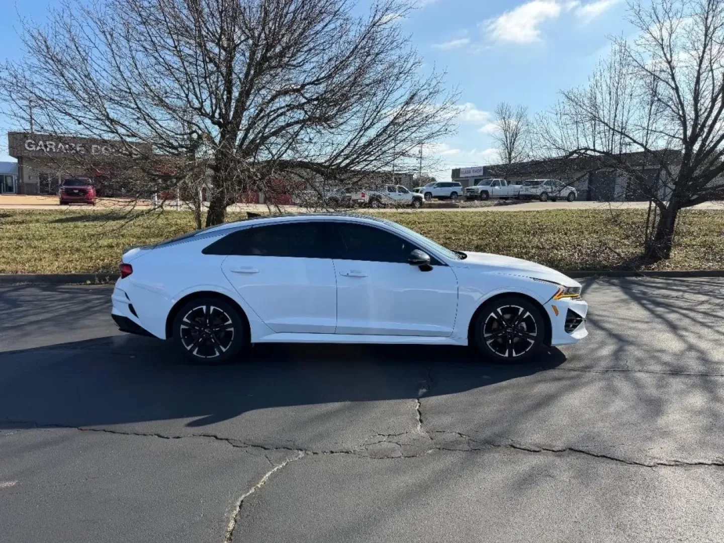 2022 /Black Leather Kia K5 GT-Line (5XXG64J20NG) with an 1.6L Turbo GDI DOHC I4 engine, Automatic transmission, located at 970 Woodlawn Dr., Farmington, MO, 63640, (573) 431-7800, 37.825642, -90.468674 - Discover the perfect blend of style, efficiency, and comfort with the 2022 Kia K5 GT-Line, an exceptional choice for those seeking a reliable yet luxurious ride. Whether you're commuting to work, taking the family on a weekend getaway, or simply running errands around Farmington, MO, this four-door - Photo#1