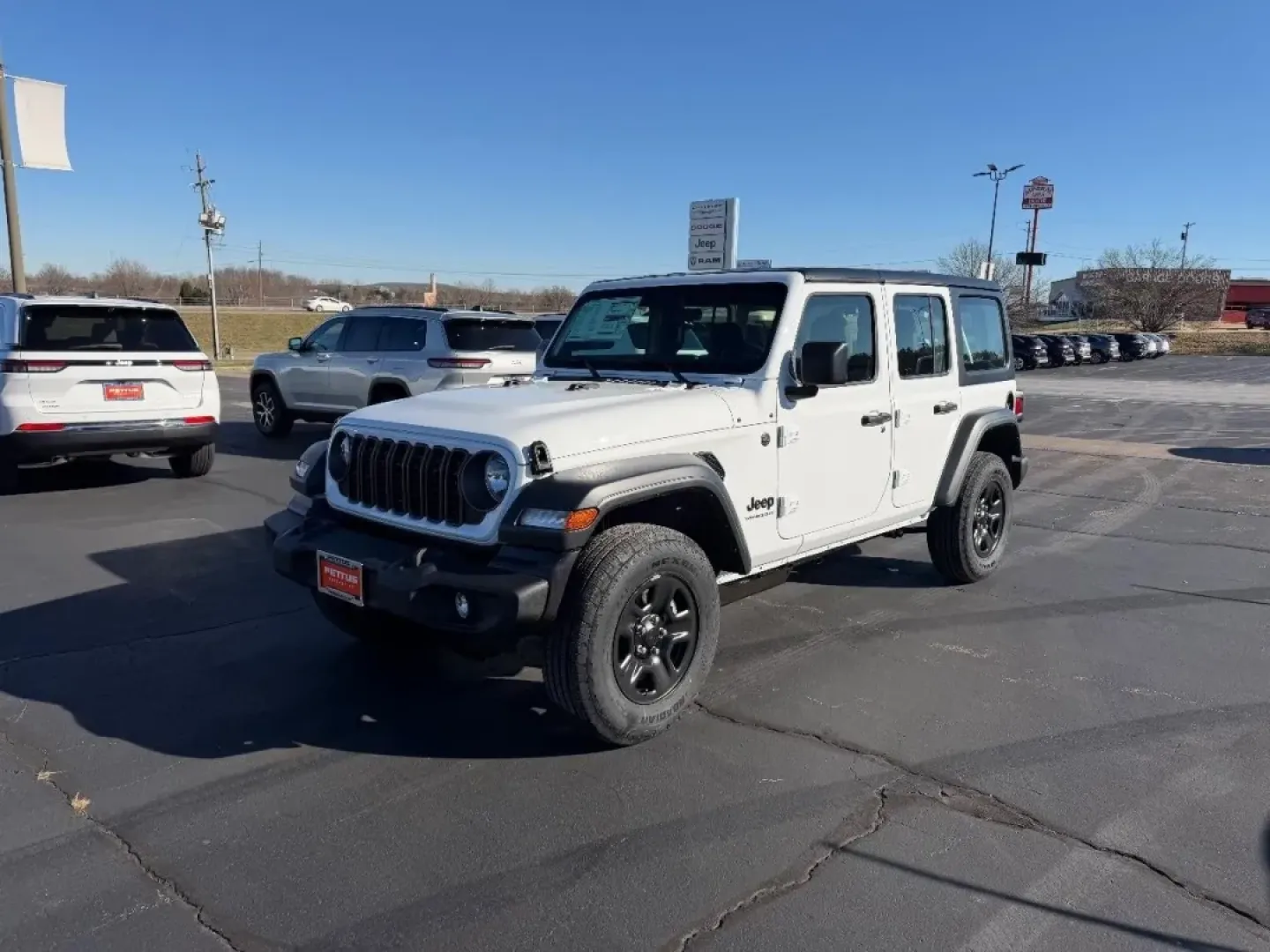 2026 /Black Cloth Jeep Wrangler Sport (1C4PJXDN8TW) with an 2.0L engine, 6M transmission, located at 970 Woodlawn Dr., Farmington, MO, 63640, (573) 431-7800, 37.825642, -90.468674 - **Adventure Awaits: Your 2026 Jeep Wrangler at Pettus CDJR Farmington!**<br /> <br /> Are you ready to explore the great outdoors or tackle your daily commute with style? The 2026 Jeep Wrangler is designed for those who crave adventure while enjoying the comforts of a modern SUV. Whether you're navi - Photo#6