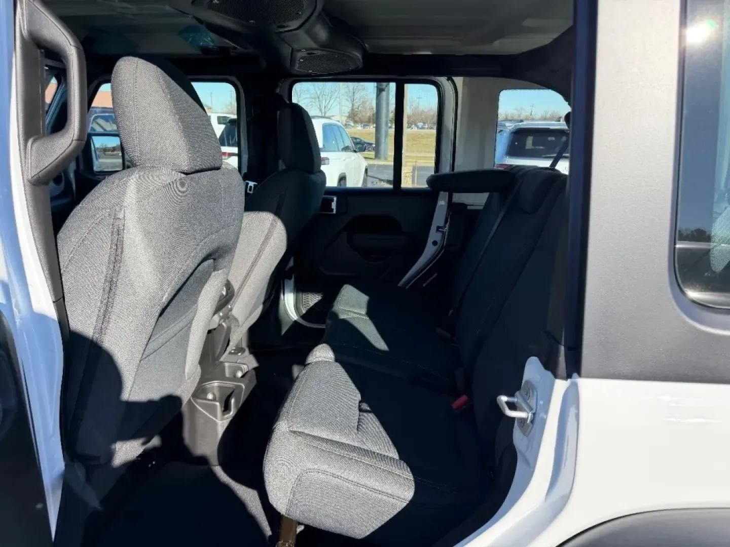 2026 /Black Cloth Jeep Wrangler Sport (1C4PJXDN8TW) with an 2.0L engine, 6M transmission, located at 970 Woodlawn Dr., Farmington, MO, 63640, (573) 431-7800, 37.825642, -90.468674 - **Adventure Awaits: Your 2026 Jeep Wrangler at Pettus CDJR Farmington!**<br /> <br /> Are you ready to explore the great outdoors or tackle your daily commute with style? The 2026 Jeep Wrangler is designed for those who crave adventure while enjoying the comforts of a modern SUV. Whether you're navi - Photo#8