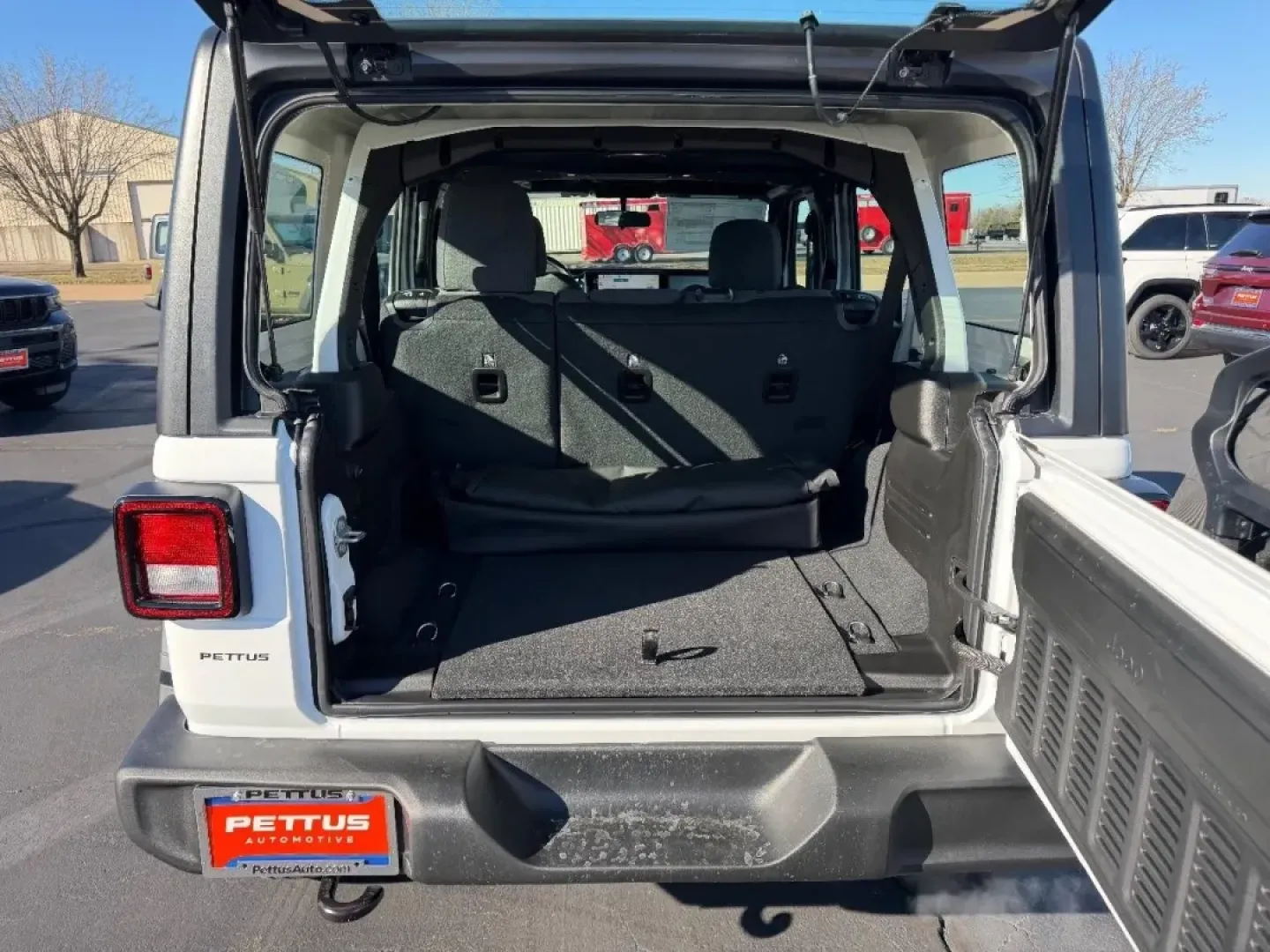 2026 /Black Cloth Jeep Wrangler Sport (1C4PJXDN8TW) with an 2.0L engine, 6M transmission, located at 970 Woodlawn Dr., Farmington, MO, 63640, (573) 431-7800, 37.825642, -90.468674 - **Adventure Awaits: Your 2026 Jeep Wrangler at Pettus CDJR Farmington!**<br /> <br /> Are you ready to explore the great outdoors or tackle your daily commute with style? The 2026 Jeep Wrangler is designed for those who crave adventure while enjoying the comforts of a modern SUV. Whether you're navi - Photo#4