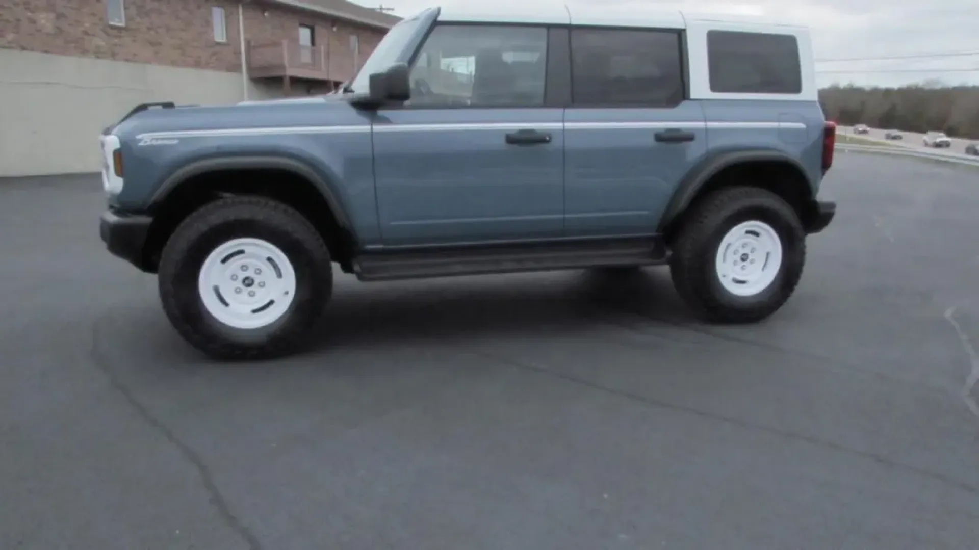 2025 /Navy Pier Ford Bronco Heritage Edition (1FMEE4DP7SL) with an 2.7L V6 engine, located at 12836 Highway 21, De Soto, MO, 63020, (636) 337-7777, 38.151867, -90.575615 - Explore the great outdoors and embark on unforgettable adventures with the 2025 Ford Bronco Heritage Edition, now available at Pettus Ford De Soto! This striking SUV, finished in a stunning Azure Gray, is perfect for individuals and families who crave a vehicle that can handle the rugged terrain and - Photo#3