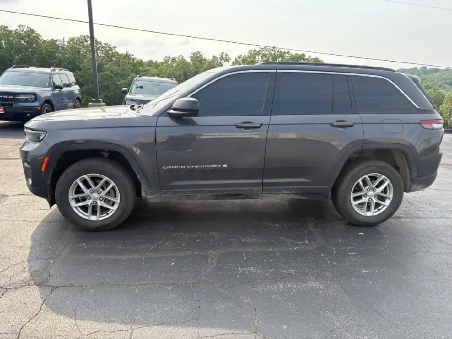 2024 /Global Black Cloth Jeep Grand Cherokee Laredo (1C4RJHAGXRC) with an Other engine, located at 12836 Highway 21, De Soto, MO, 63020, (636) 337-7777, 38.151867, -90.575615 - **Explore New Horizons with the 2024 Jeep Grand Cherokee Laredo at Pettus Ford De Soto!**<br /> <br /> Are you ready to elevate your driving experience and embark on unforgettable adventures? The 2024 Jeep Grand Cherokee Laredo is the perfect SUV for those seeking a blend of luxury and rugged capabi - Photo#1