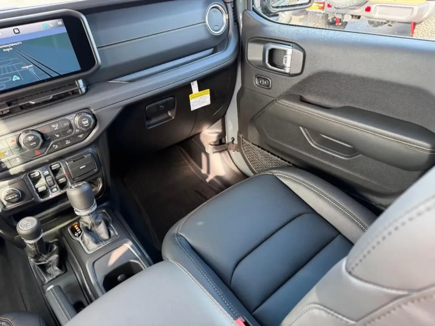 2026 /Black Leather Jeep Wrangler Sahara (1C4PJXENXTW) with an 2.0L engine, 6M transmission, located at 970 Woodlawn Dr., Farmington, MO, 63640, (573) 431-7800, 37.825642, -90.468674 - ### Adventure Awaits with the 2026 Jeep Wrangler Sahara at Pettus CDJR Farmington!<br /> <br /> If you're seeking a vehicle that embodies both rugged durability and modern comfort, look no further than the 2026 Jeep Wrangler Sahara, available exclusively at Pettus CDJR Farmington. This SUV is design - Photo#15