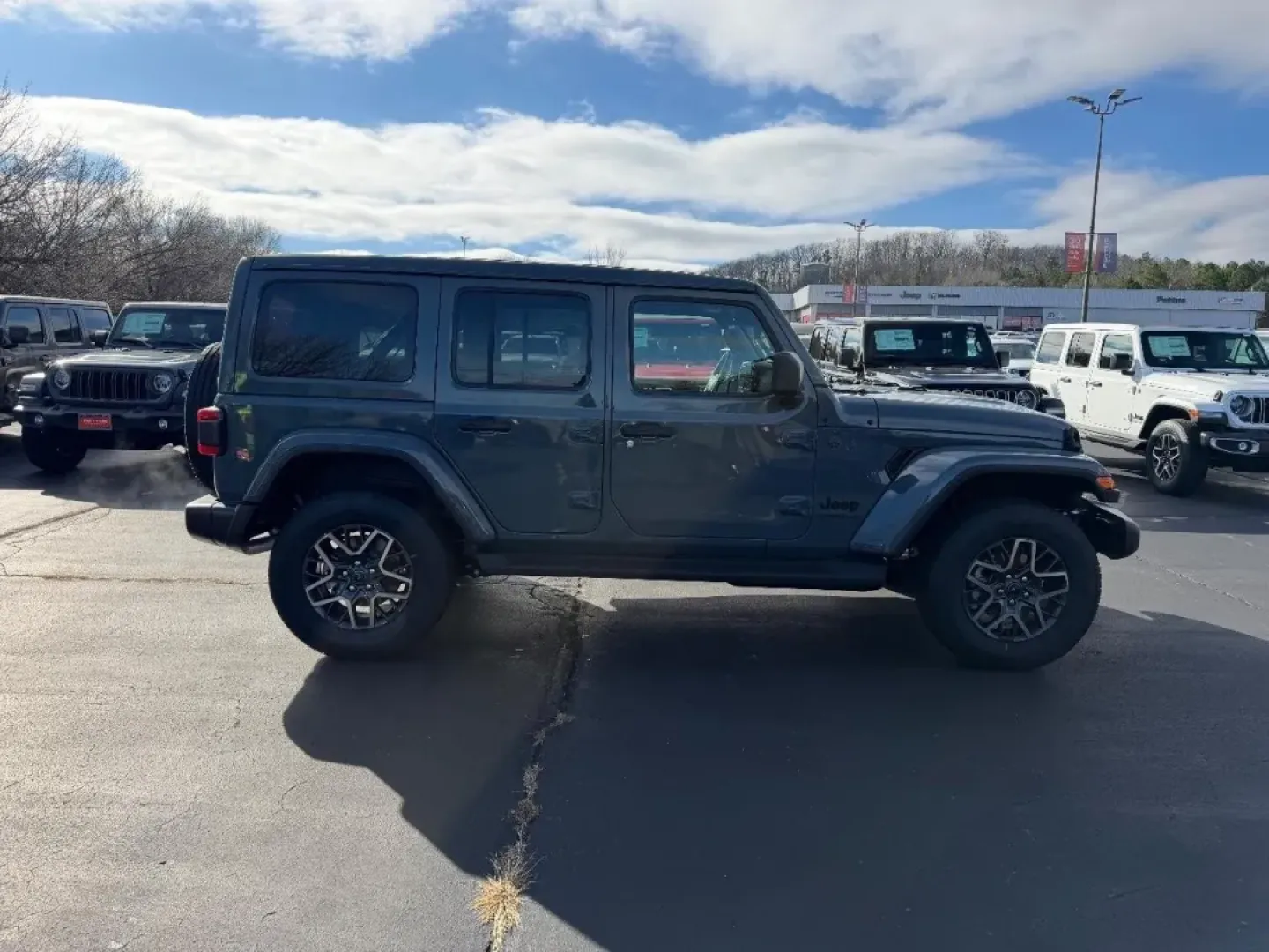2026 /Black Leather Jeep Wrangler Sahara (1C4PJXENXTW) with an 2.0L engine, 6M transmission, located at 970 Woodlawn Dr., Farmington, MO, 63640, (573) 431-7800, 37.825642, -90.468674 - ### Adventure Awaits with the 2026 Jeep Wrangler Sahara at Pettus CDJR Farmington!<br /> <br /> If you're seeking a vehicle that embodies both rugged durability and modern comfort, look no further than the 2026 Jeep Wrangler Sahara, available exclusively at Pettus CDJR Farmington. This SUV is design - Photo#1