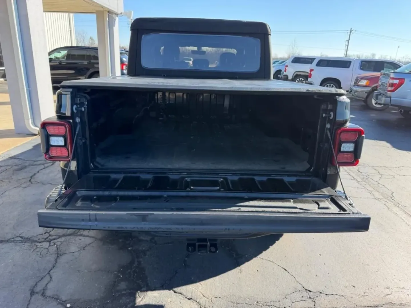 2022 /Black Leather Jeep Gladiator Rubicon (1C6JJTBG7NL) with an 3.6L V6 24V VVT UPG I engine, 6M transmission, located at 141 Commercial Dr, Fredericktown, MO, 63645, (573) 783-6432, 37.570087, -90.320648 - Are you ready to elevate your weekend adventures and daily commutes? Look no further than this stylish and rugged 2022 Jeep Gladiator 4WD Rubicon, now available at Pettus Ford Fredericktown. Located conveniently at 141 Commercial Drive, Fredericktown, MO 63645, we specialize in quality used vehicles - Photo#4