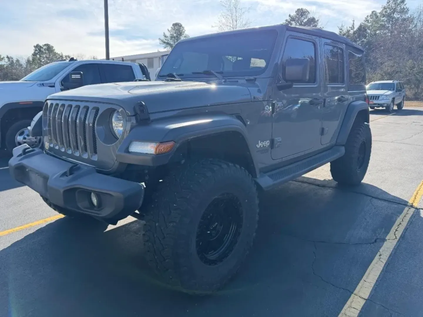 2020 /Black Jeep Wrangler Unlimited Sport (1C4HJXDNXLW) with an Other engine, Automatic transmission, located at 970 Woodlawn Dr., Farmington, MO, 63640, (573) 431-7800, 37.825642, -90.468674 - **Adventure Awaits in the 2020 Jeep Wrangler Unlimited Sport** <br /> Are you ready to take on the open road, explore rugged terrains, or simply enjoy a weekend getaway with family and friends? The 2020 Jeep Wrangler Unlimited Sport is your gateway to adventure, blending capability with comfort. Wh - Photo#0
