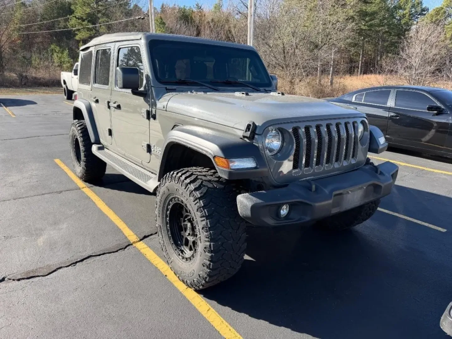 2020 /Black Jeep Wrangler Unlimited Sport (1C4HJXDNXLW) with an Other engine, Automatic transmission, located at 970 Woodlawn Dr., Farmington, MO, 63640, (573) 431-7800, 37.825642, -90.468674 - **Adventure Awaits in the 2020 Jeep Wrangler Unlimited Sport** <br /> Are you ready to take on the open road, explore rugged terrains, or simply enjoy a weekend getaway with family and friends? The 2020 Jeep Wrangler Unlimited Sport is your gateway to adventure, blending capability with comfort. Wh - Photo#1
