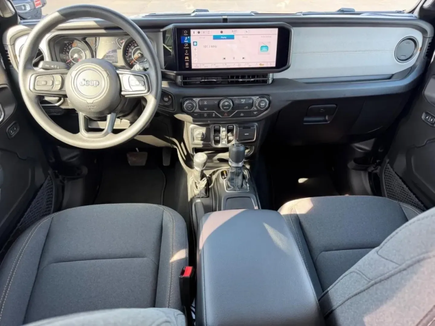 2026 /Black Cloth Jeep Wrangler Sport (1C4PJXDN4TW) with an 2.0L engine, 6M transmission, located at 970 Woodlawn Dr., Farmington, MO, 63640, (573) 431-7800, 37.825642, -90.468674 - Embark on your next adventure with the 2026 Jeep Wrangler, a vehicle that perfectly blends rugged capability with everyday practicality. Whether you're navigating the bustling streets of Farmington or conquering the trails of nearby Washington State Park, this SUV is designed for those who crave exp - Photo#9