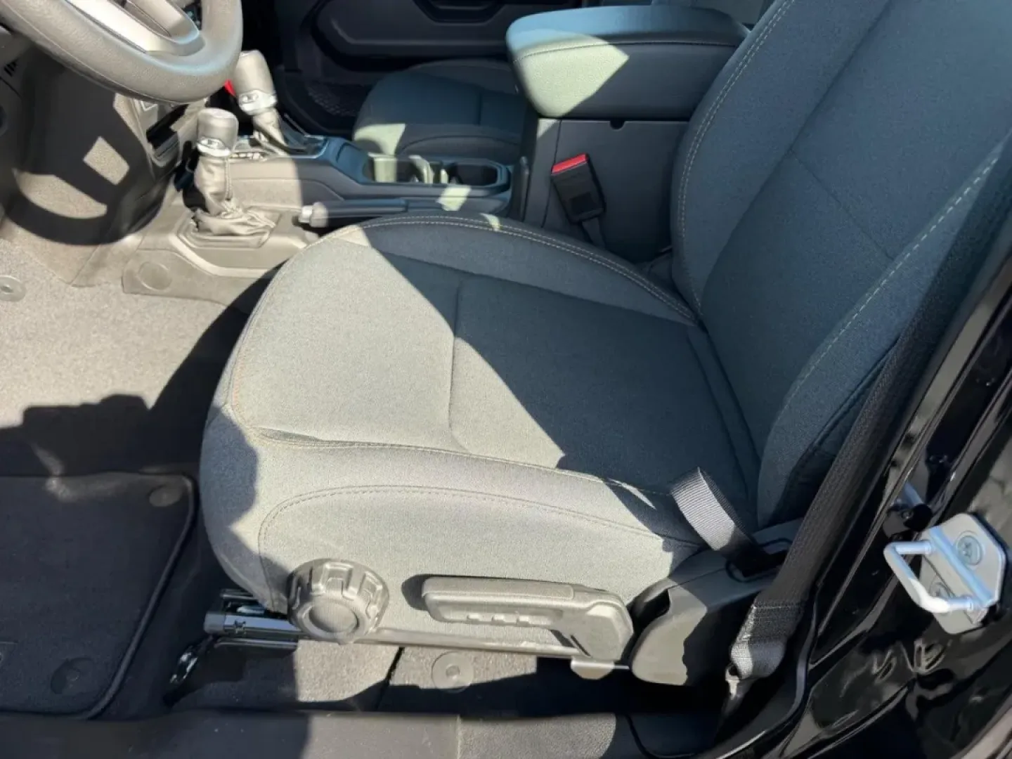 2026 /Black Cloth Jeep Wrangler Sport (1C4PJXDN4TW) with an 2.0L engine, 6M transmission, located at 970 Woodlawn Dr., Farmington, MO, 63640, (573) 431-7800, 37.825642, -90.468674 - Embark on your next adventure with the 2026 Jeep Wrangler, a vehicle that perfectly blends rugged capability with everyday practicality. Whether you're navigating the bustling streets of Farmington or conquering the trails of nearby Washington State Park, this SUV is designed for those who crave exp - Photo#18