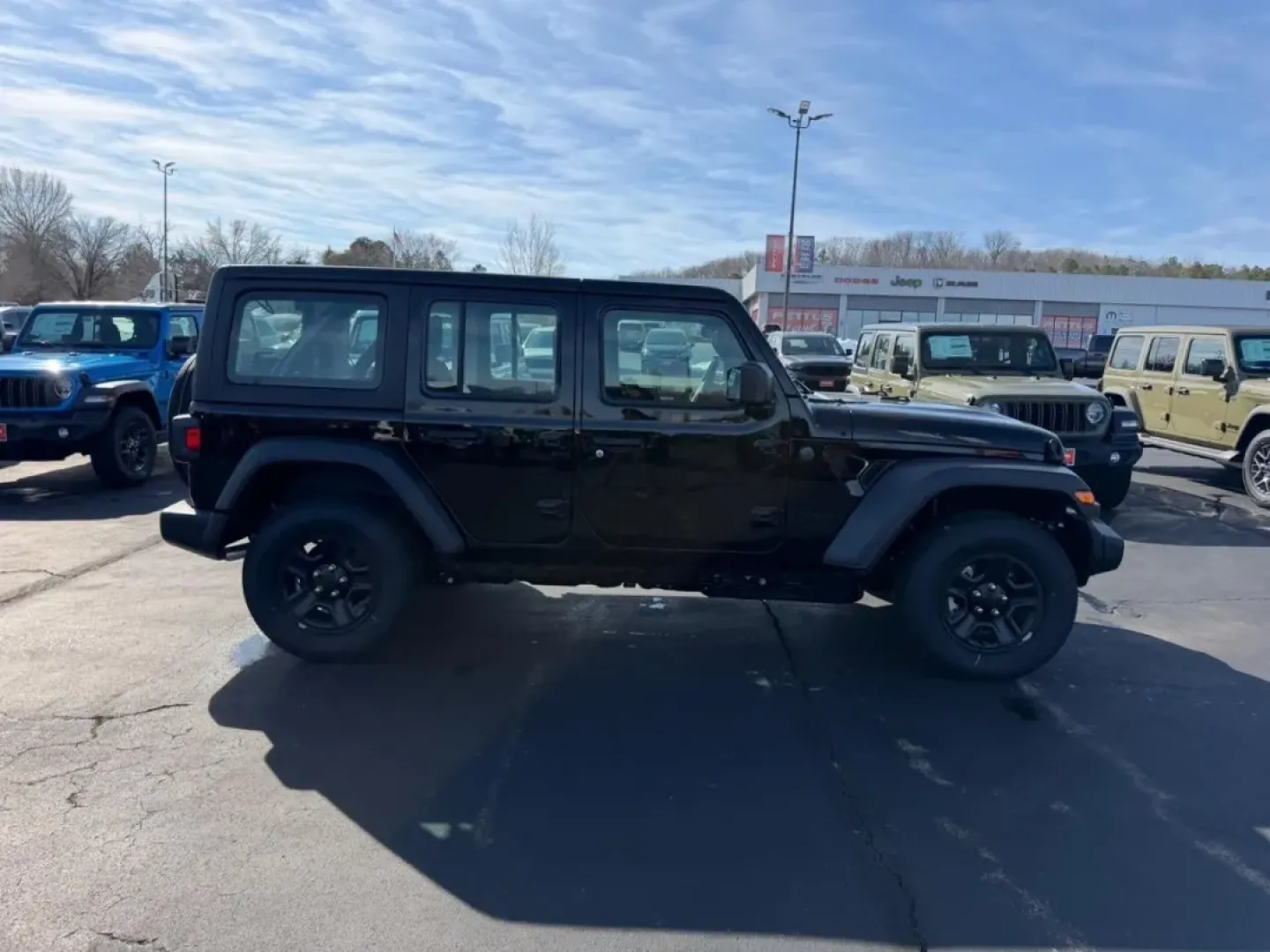 2026 /Black Cloth Jeep Wrangler Sport (1C4PJXDN4TW) with an 2.0L engine, 6M transmission, located at 970 Woodlawn Dr., Farmington, MO, 63640, (573) 431-7800, 37.825642, -90.468674 - Embark on your next adventure with the 2026 Jeep Wrangler, a vehicle that perfectly blends rugged capability with everyday practicality. Whether you're navigating the bustling streets of Farmington or conquering the trails of nearby Washington State Park, this SUV is designed for those who crave exp - Photo#1