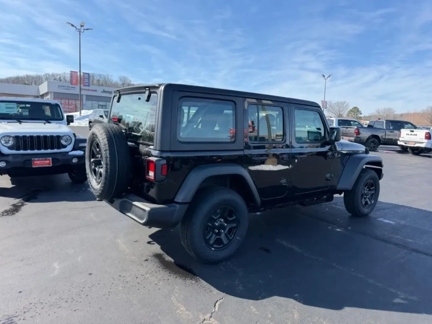 2026 /Black Cloth Jeep Wrangler Sport (1C4PJXDN4TW) with an 2.0L engine, 6M transmission, located at 970 Woodlawn Dr., Farmington, MO, 63640, (573) 431-7800, 37.825642, -90.468674 - Embark on your next adventure with the 2026 Jeep Wrangler, a vehicle that perfectly blends rugged capability with everyday practicality. Whether you're navigating the bustling streets of Farmington or conquering the trails of nearby Washington State Park, this SUV is designed for those who crave exp - Photo#2