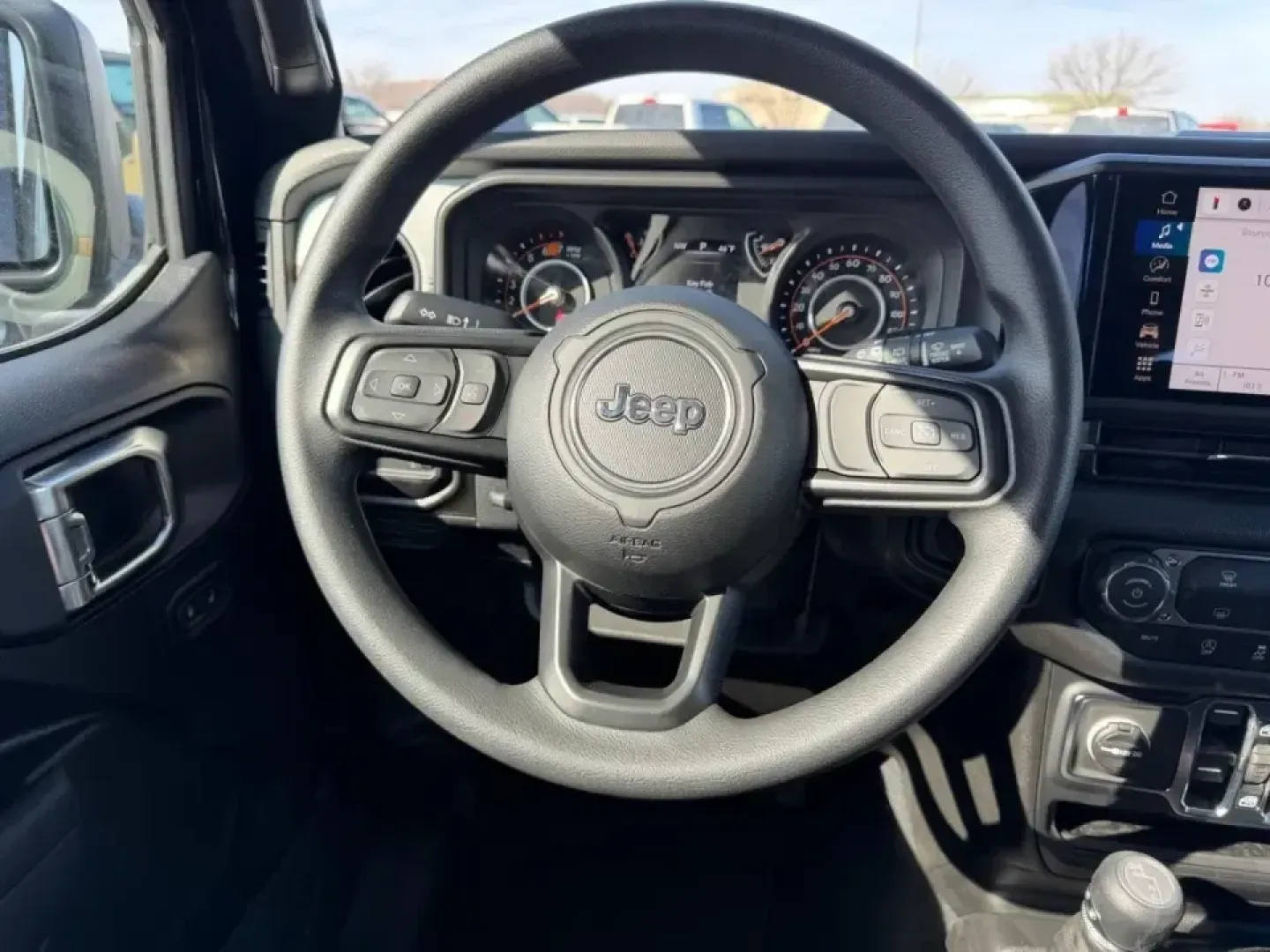 2026 /Black Cloth Jeep Wrangler Sport (1C4PJXDN4TW) with an 2.0L engine, 6M transmission, located at 970 Woodlawn Dr., Farmington, MO, 63640, (573) 431-7800, 37.825642, -90.468674 - Embark on your next adventure with the 2026 Jeep Wrangler, a vehicle that perfectly blends rugged capability with everyday practicality. Whether you're navigating the bustling streets of Farmington or conquering the trails of nearby Washington State Park, this SUV is designed for those who crave exp - Photo#10