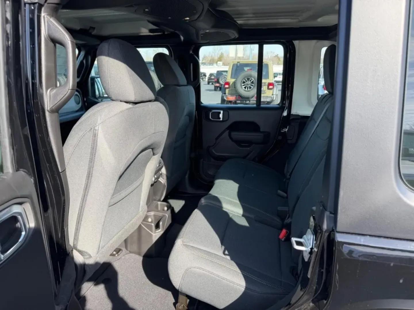 2026 /Black Cloth Jeep Wrangler Sport (1C4PJXDN4TW) with an 2.0L engine, 6M transmission, located at 970 Woodlawn Dr., Farmington, MO, 63640, (573) 431-7800, 37.825642, -90.468674 - Embark on your next adventure with the 2026 Jeep Wrangler, a vehicle that perfectly blends rugged capability with everyday practicality. Whether you're navigating the bustling streets of Farmington or conquering the trails of nearby Washington State Park, this SUV is designed for those who crave exp - Photo#8