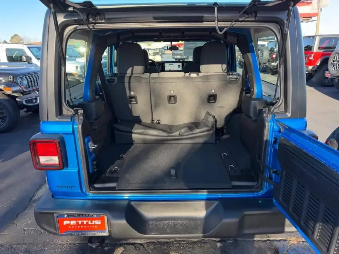 2026 /Black Cloth Jeep Wrangler Sport (1C4PJXDN6TW) with an 2.0L engine, 6M transmission, located at 970 Woodlawn Dr., Farmington, MO, 63640, (573) 431-7800, 37.825642, -90.468674 - **Adventure Awaits with the 2026 Jeep Wrangler at Pettus CDJR Farmington!**<br /> <br /> Are you ready to elevate your outdoor adventures and weekend getaways? Look no further than the stunning 2026 Jeep Wrangler, now available at Pettus CDJR Farmington! This rugged yet refined SUV is not just a veh - Photo#4