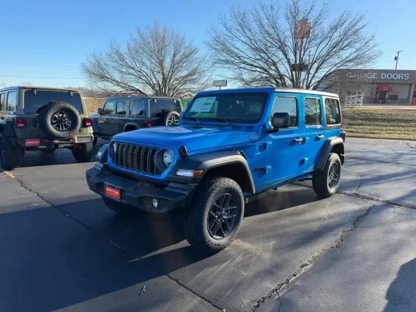 2026 /Black Cloth Jeep Wrangler Sport (1C4PJXDN6TW) with an 2.0L engine, 6M transmission, located at 970 Woodlawn Dr., Farmington, MO, 63640, (573) 431-7800, 37.825642, -90.468674 - **Adventure Awaits with the 2026 Jeep Wrangler at Pettus CDJR Farmington!**<br /> <br /> Are you ready to elevate your outdoor adventures and weekend getaways? Look no further than the stunning 2026 Jeep Wrangler, now available at Pettus CDJR Farmington! This rugged yet refined SUV is not just a veh - Photo#6