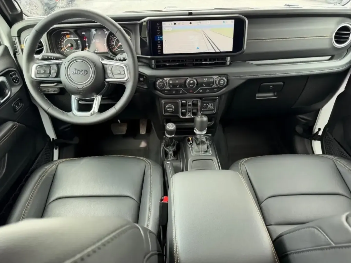 2026 /Black Leather Jeep Wrangler Sahara (1C4PJXEG9TW) with an 3.6L V6 engine, 6M transmission, located at 970 Woodlawn Dr., Farmington, MO, 63640, (573) 431-7800, 37.825642, -90.468674 - **Explore the Great Outdoors with the 2026 Jeep Wrangler Sahara at Pettus CDJR Farmington!**<br /> <br /> Adventure awaits! If you're seeking a vehicle that combines rugged capability with everyday comfort, look no further than this impressive 2026 Jeep Wrangler Sahara. Perfect for weekend getaways - Photo#9