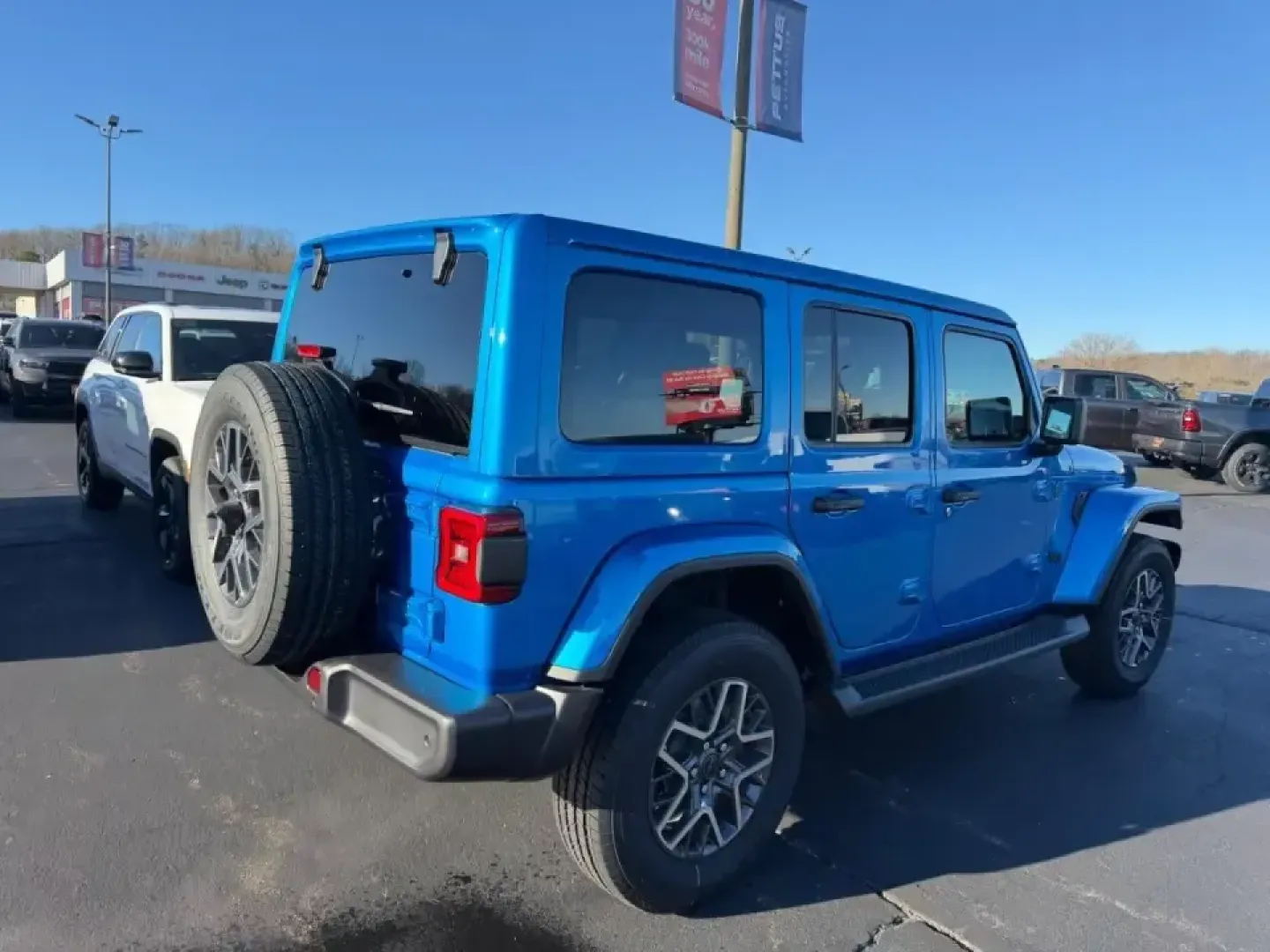 2026 /Black Leather Jeep Wrangler Sahara (1C4PJXEN3TW) with an 2.0L engine, 6M transmission, located at 970 Woodlawn Dr., Farmington, MO, 63640, (573) 431-7800, 37.825642, -90.468674 - ### Explore Life's Adventures with the 2026 Jeep Wrangler Sahara A Perfect SUV for All Your Family Escapades!<br /> <br /> Are you ready to elevate your lifestyle? The 2026 Jeep Wrangler Sahara in an eye-catching Hydro Blue is not just an SUV; it's your gateway to adventure! Whether you're hitting - Photo#3