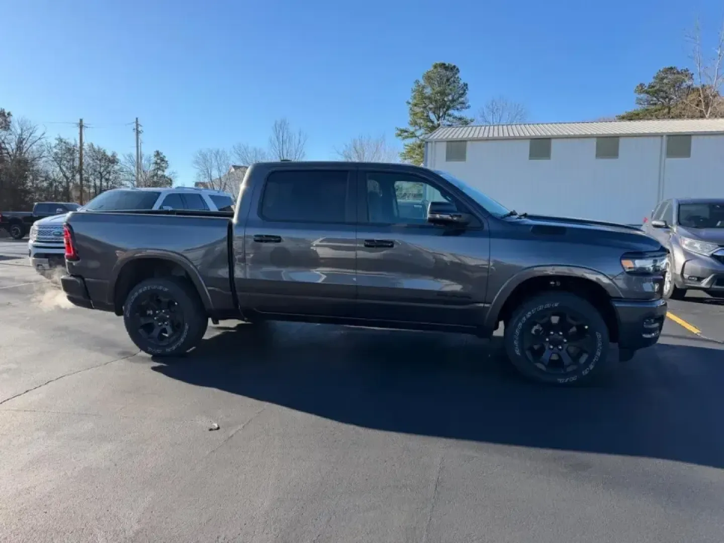 2026 /Black Cloth Ram 1500 Big Horn/Lone Star (1C6SRFFP1TN) with an 3.0L Straight 6 engine, 8A transmission, located at 970 Woodlawn Dr., Farmington, MO, 63640, (573) 431-7800, 37.825642, -90.468674 - Are you in search of a vehicle that can elevate your lifestyle, whether you're tackling weekend adventures, managing daily commutes, or hauling gear for family outings? Look no further! At Pettus CDJR Farmington, we proudly present a stunning 2026 Ram 1500 Big Horn that promises to be the perfect co - Photo#1